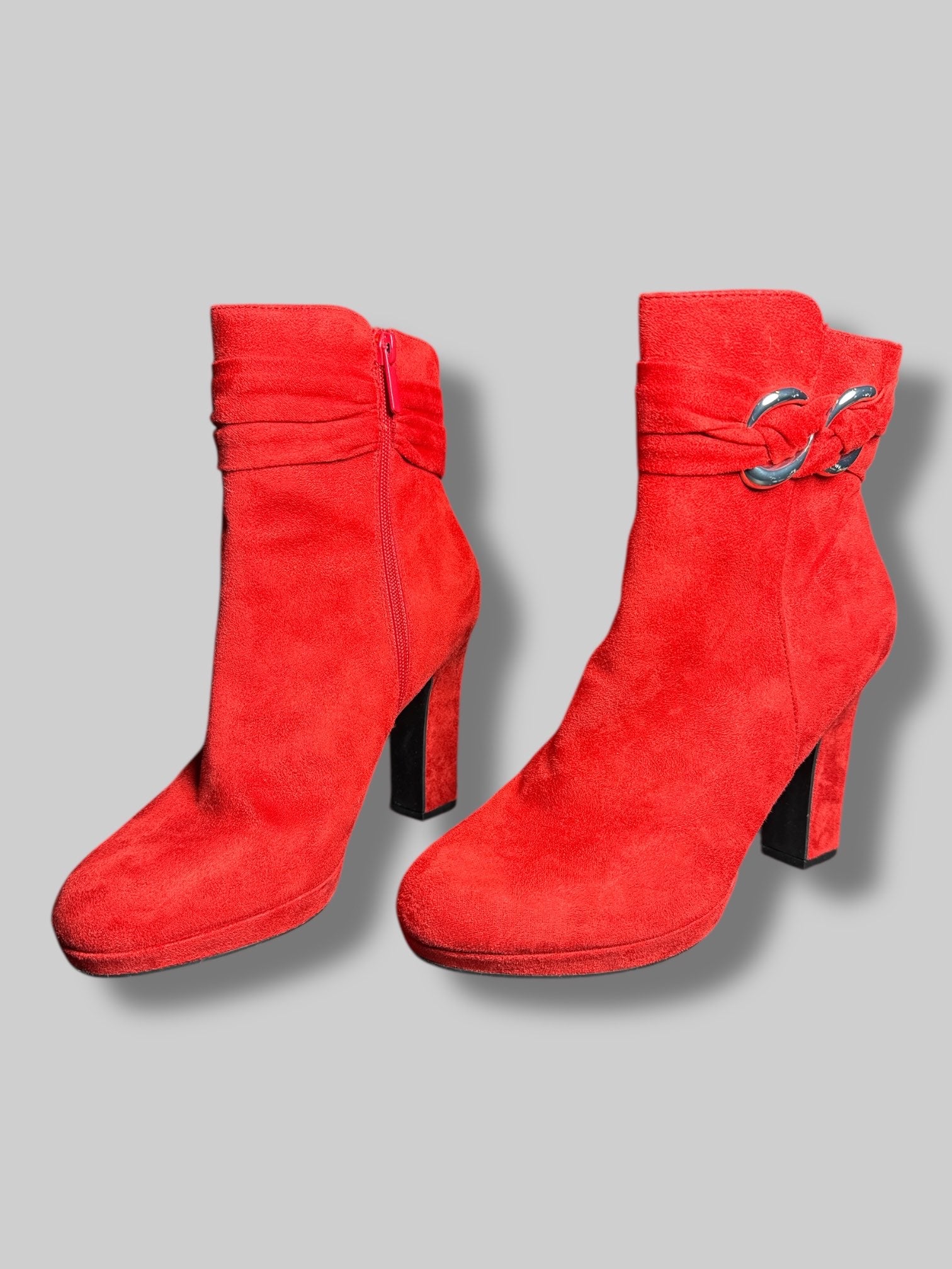 Size 9M Impo red suede-like gelled boots with zippers on sides and decorative metal details