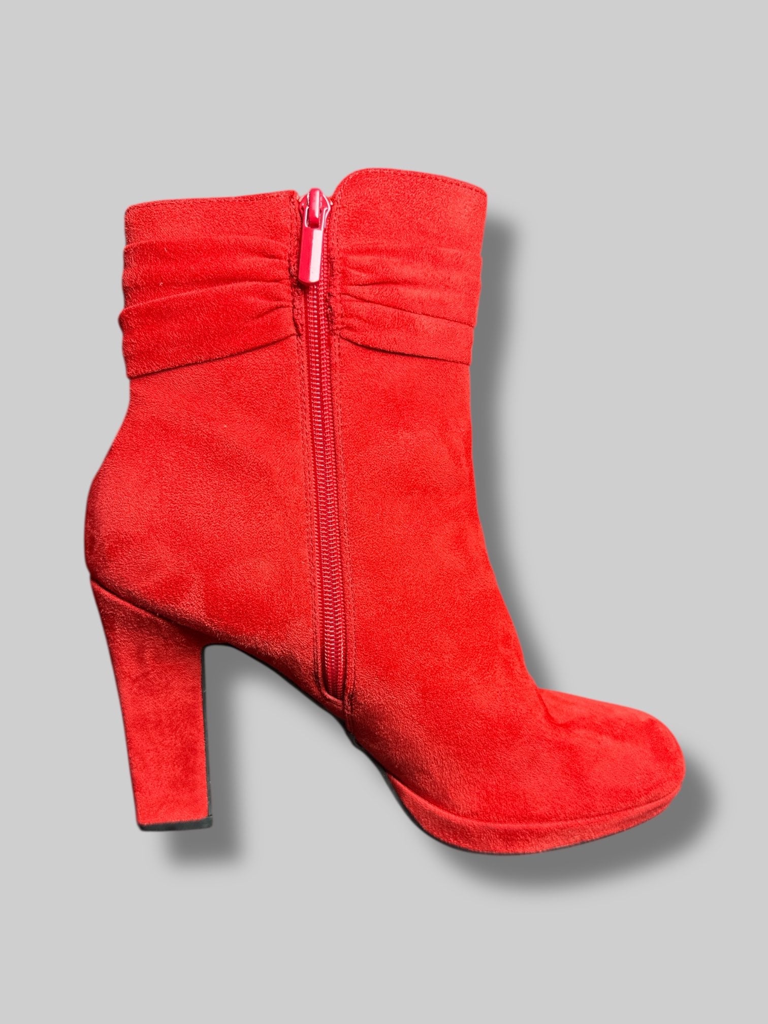 Size 9M Impo red suede-like gelled boots with zippers on sides and decorative metal details