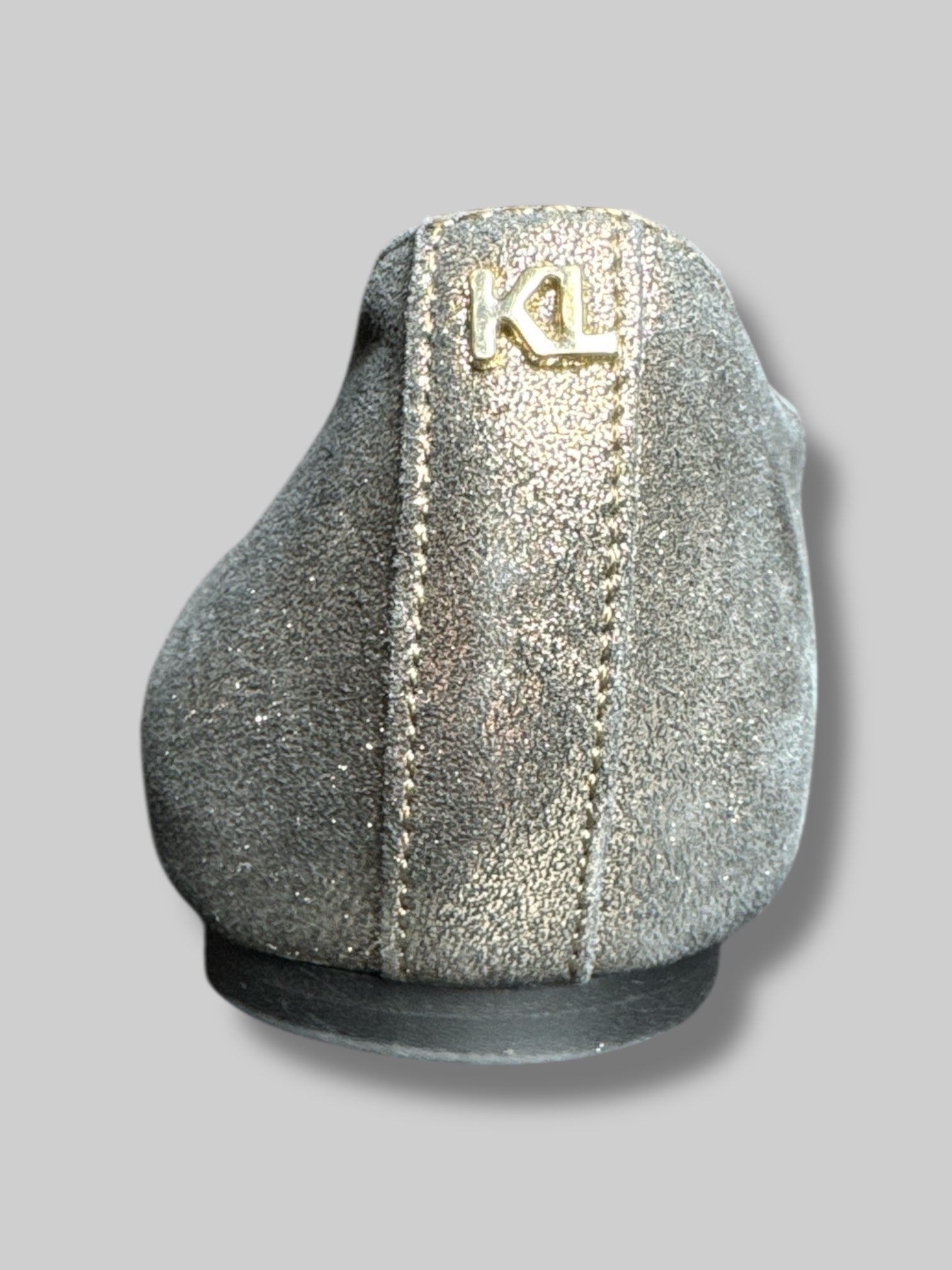 Size 7.5M Karl Lagerfeld silver pointy flats with faux pearls and cutout design on toes