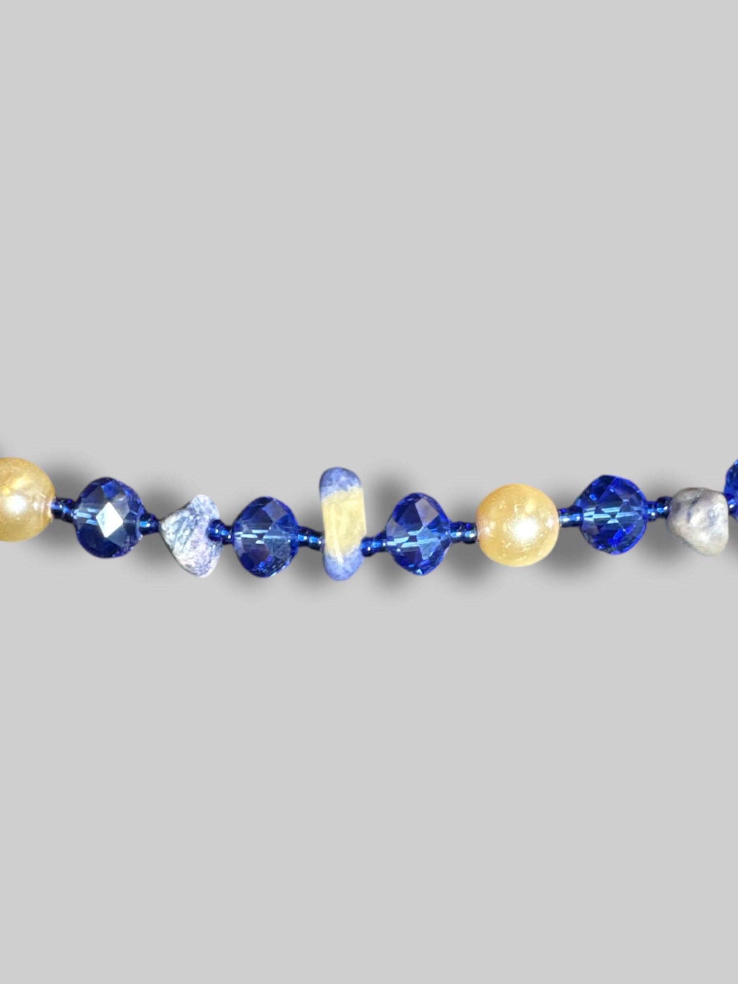 18” long Blue and pearl beaded necklace
