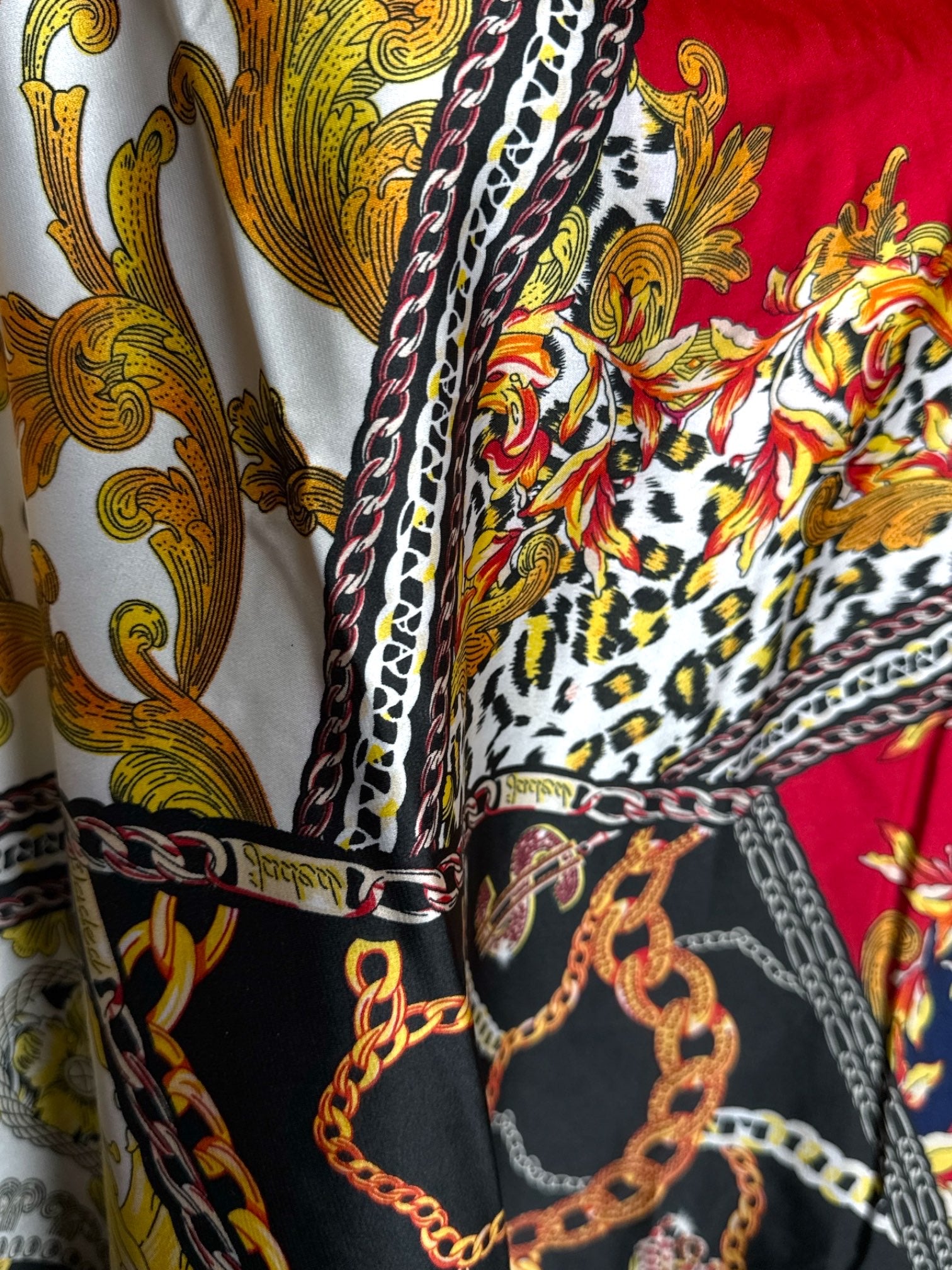 4X Ckikiou flowy multipattern top with bat wing sleeves