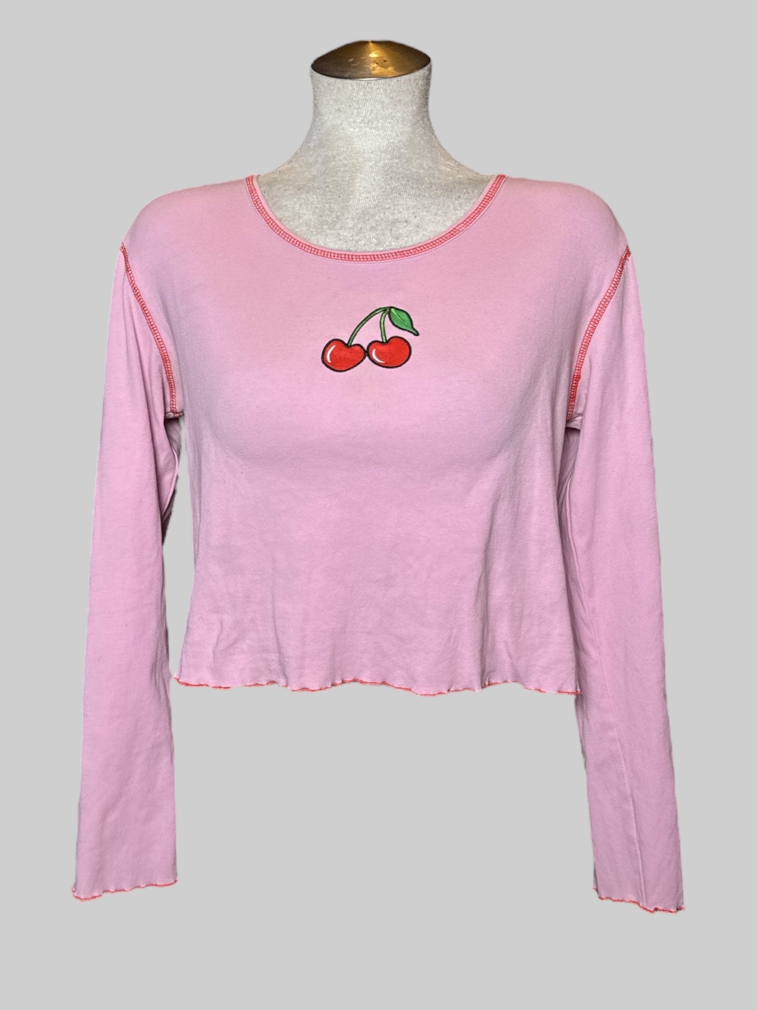 2X Delia’s light pink long sleeve top with lettuce trim and cherry embroidered