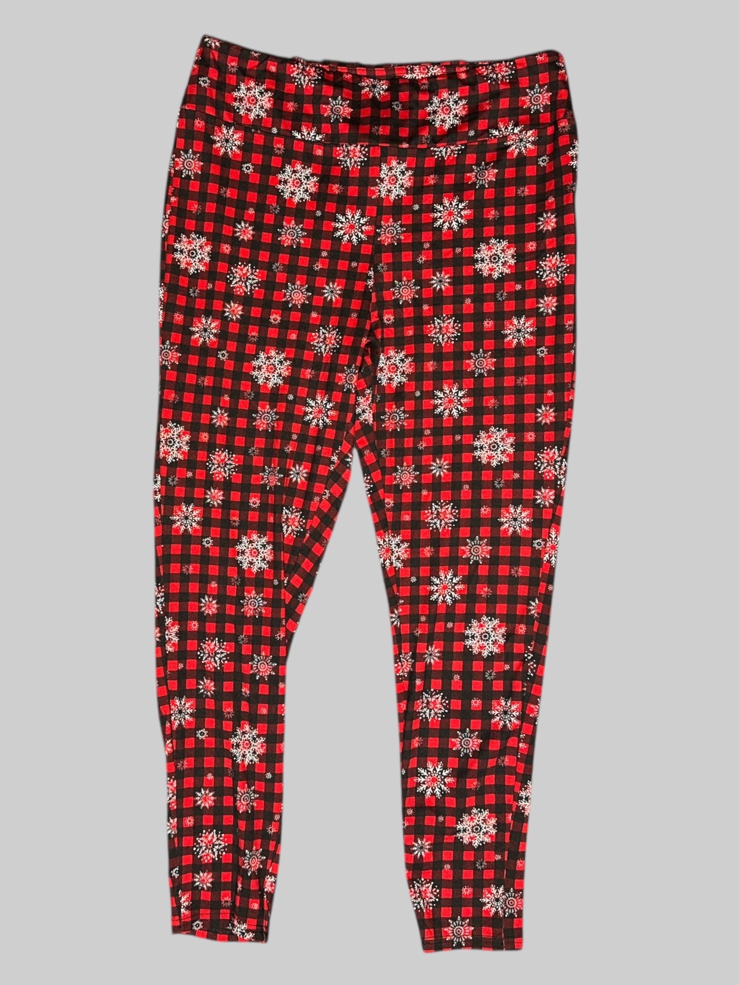 0X Rockin’ Around black and red buffalo checkered leggings with white snowflakes