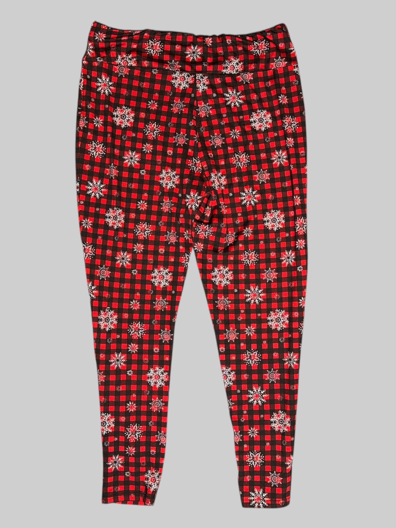 0X Rockin’ Around black and red buffalo checkered leggings with white snowflakes