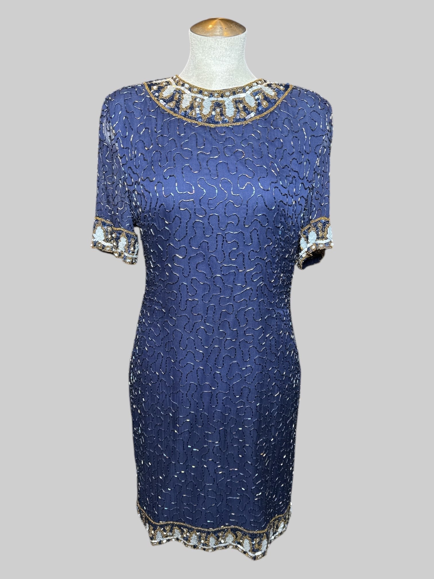 M vintage navy blue short sleeve dress with squiggly iridescent beading all over, sheer sleeves, and sequins designs on hems and cuffs