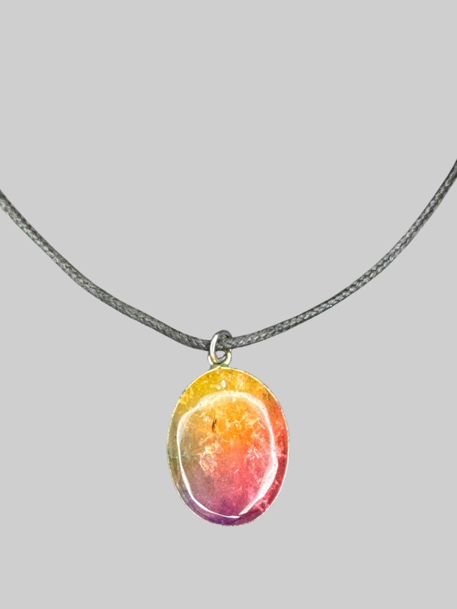 Rainbow colored stone necklace with adjustable rope