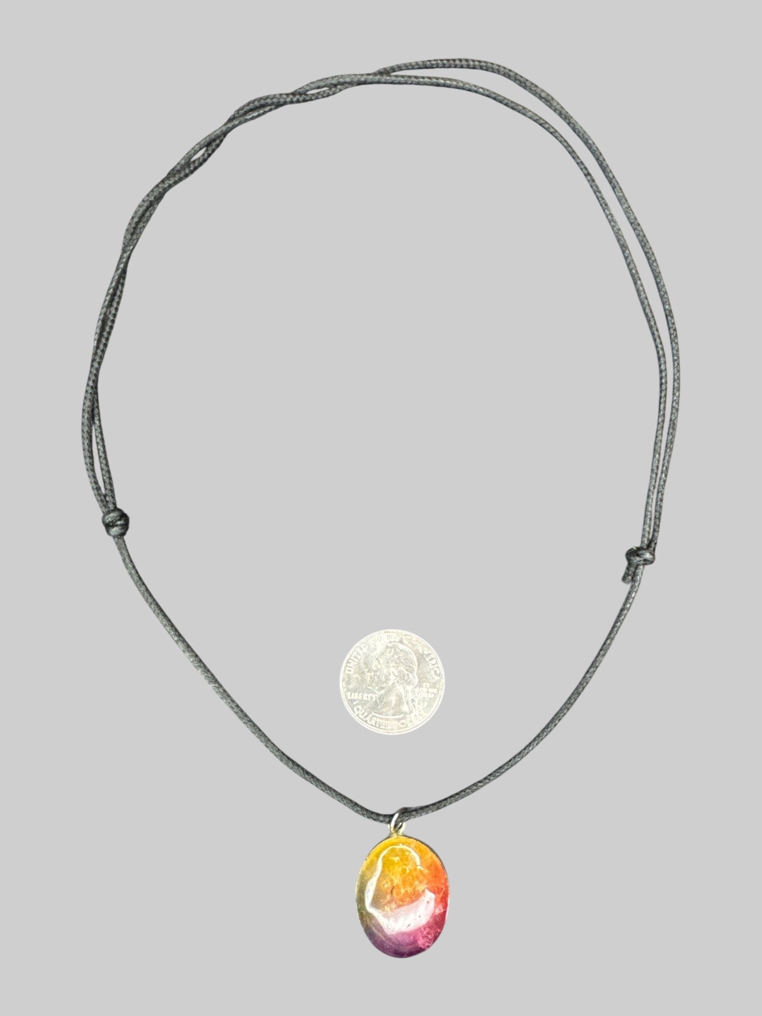 Rainbow colored stone necklace with adjustable rope