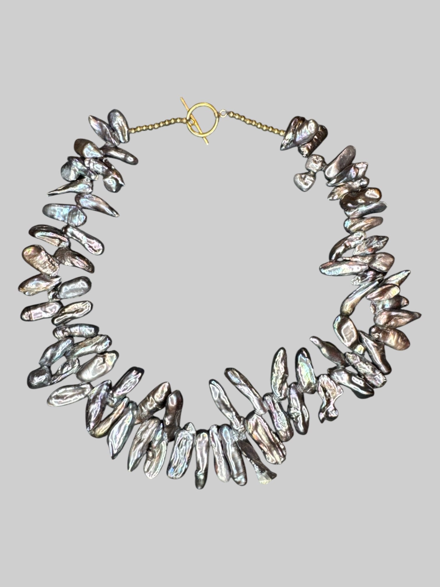 Iridescent pearl like beaded necklace with toggle clasp