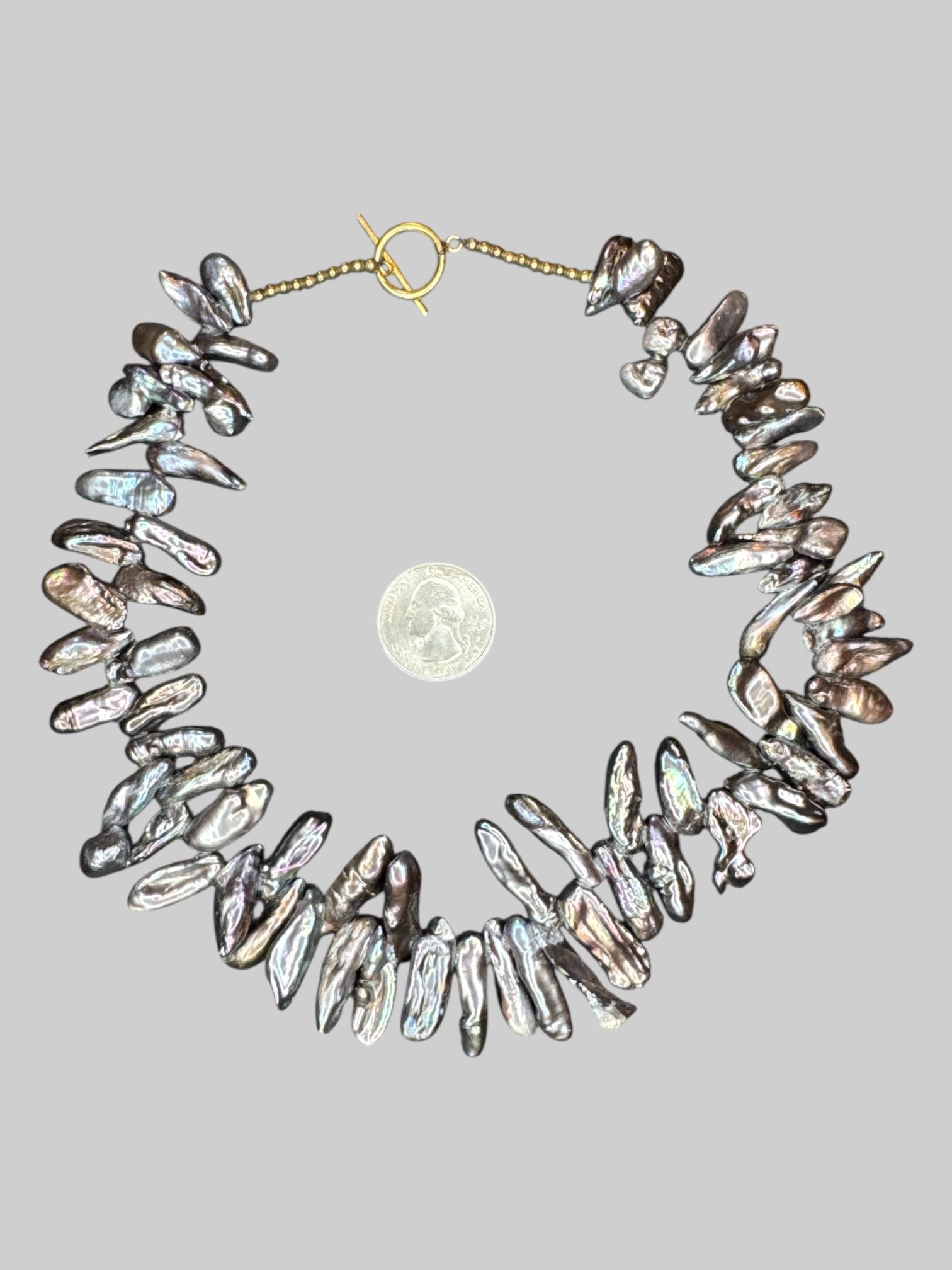 Iridescent pearl like beaded necklace with toggle clasp