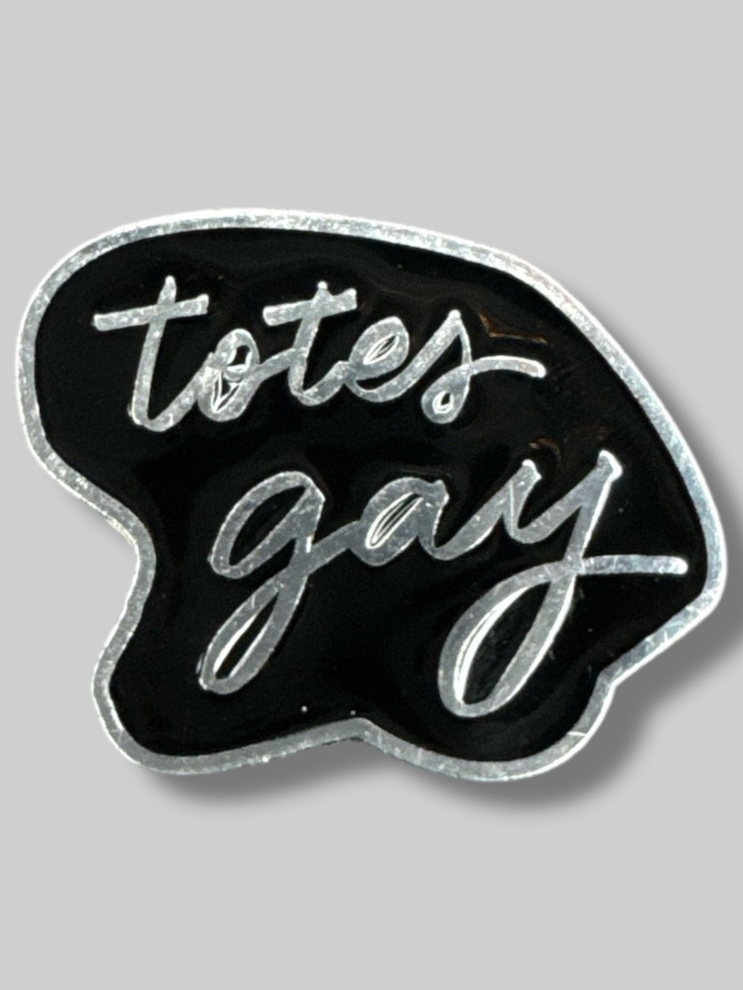 Black enamel “Totes gay”