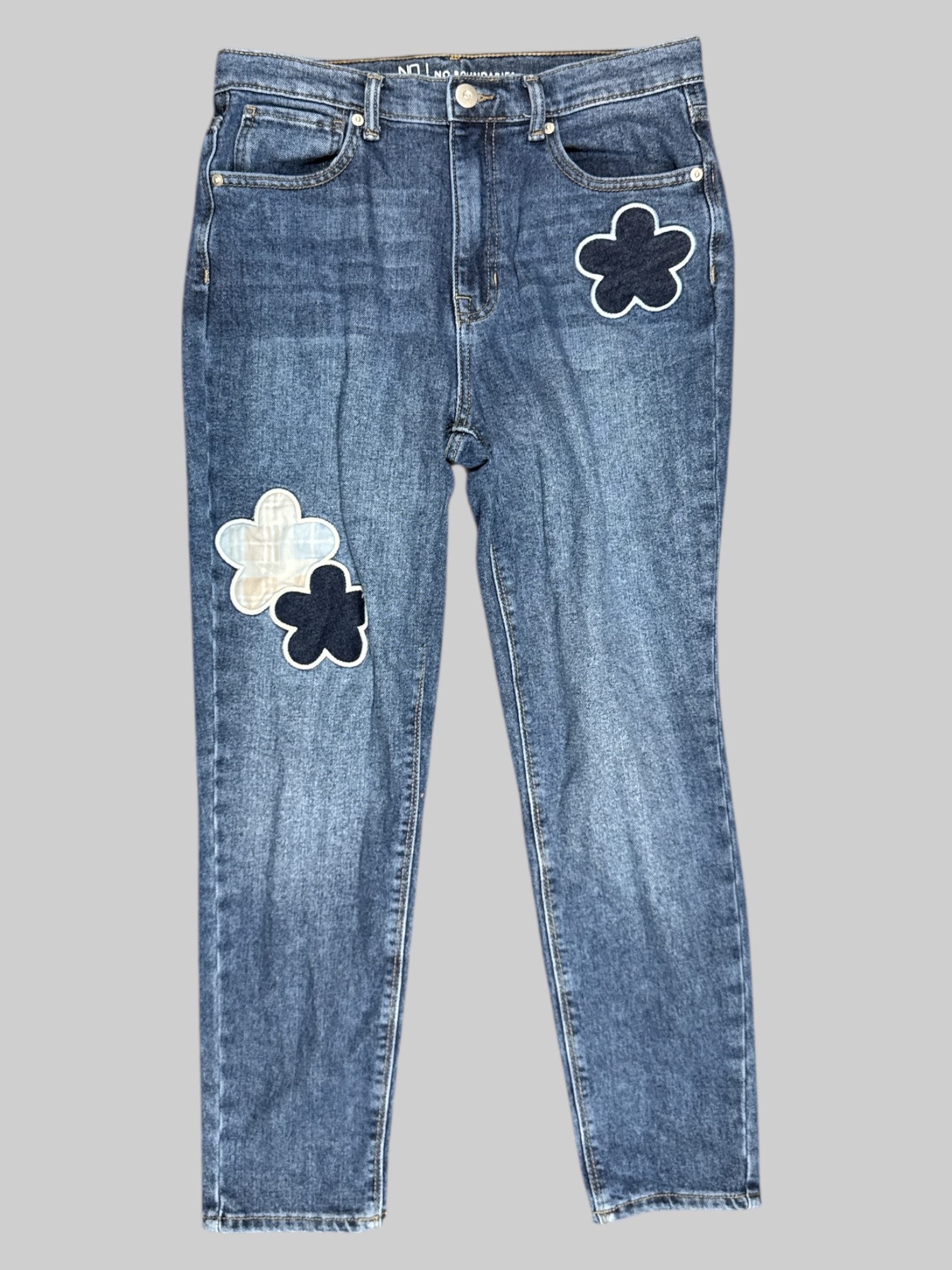 M No Boundaries light wash jeans with flower shaped patches
