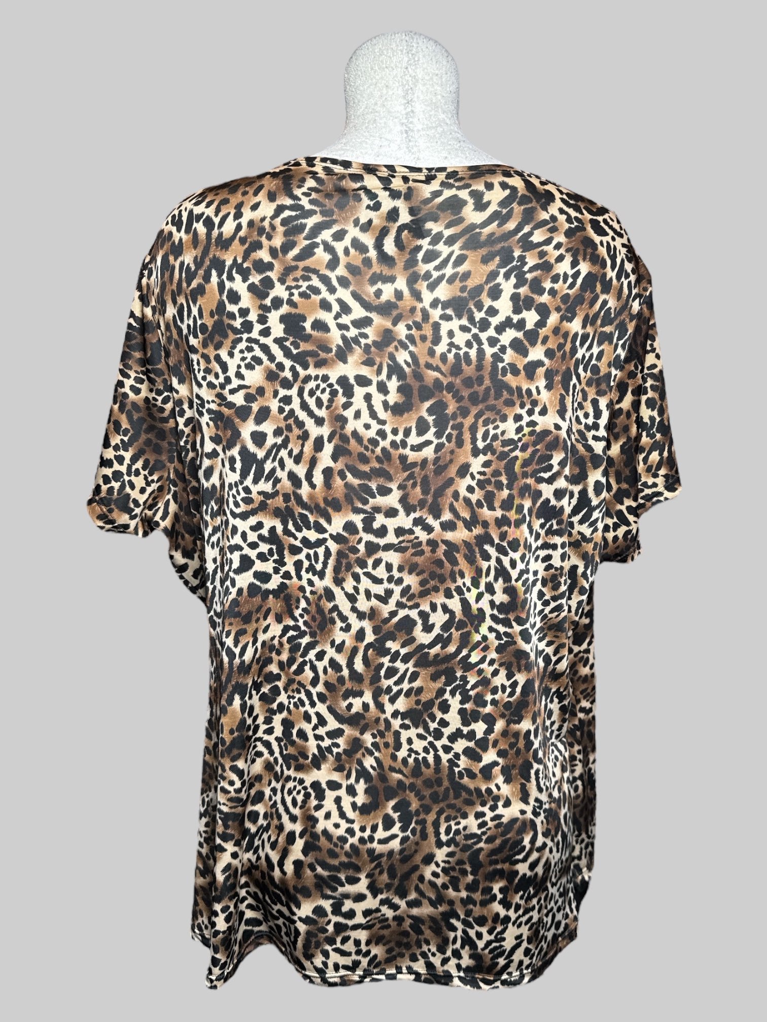 3X Elementz Woman cheetah print faux wrap short sleeve top with a buckle and attached tank top