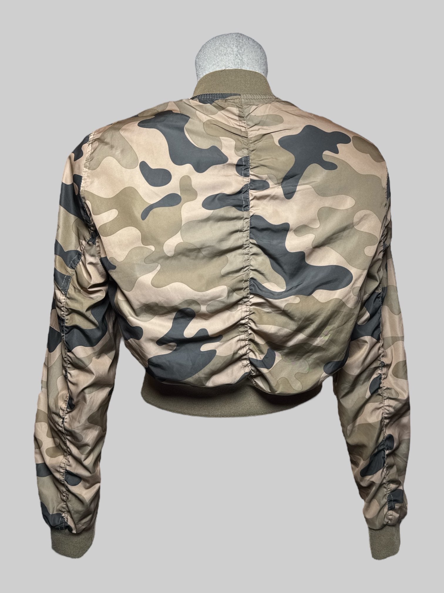 S Charlotte Russe green and black camo jacket with zipper, snap buttons,  and ruching on back