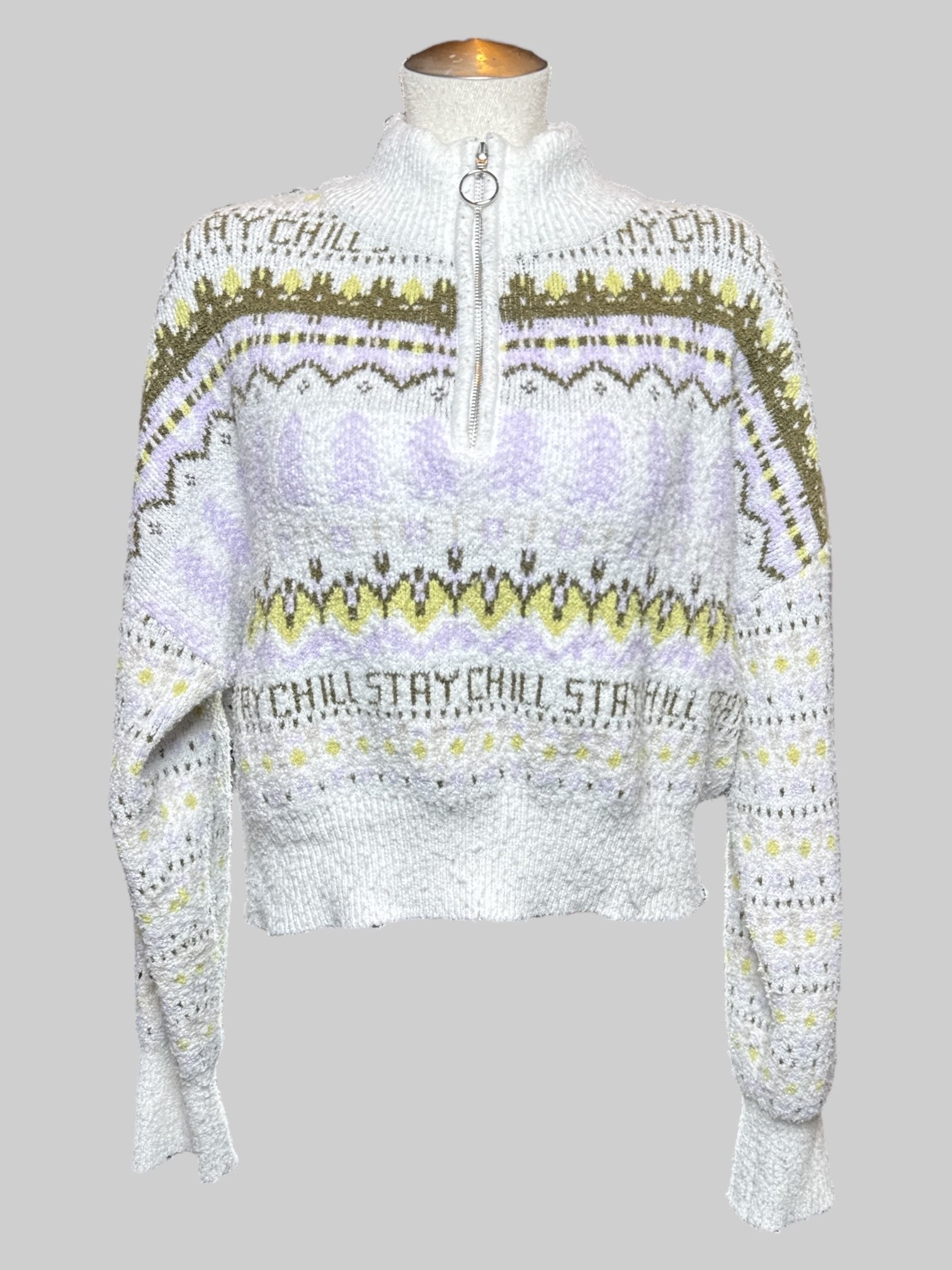 0X Arizona soft white  knit sweater with green, purple, and yellow geometric pattern, and “stay chill” lettering