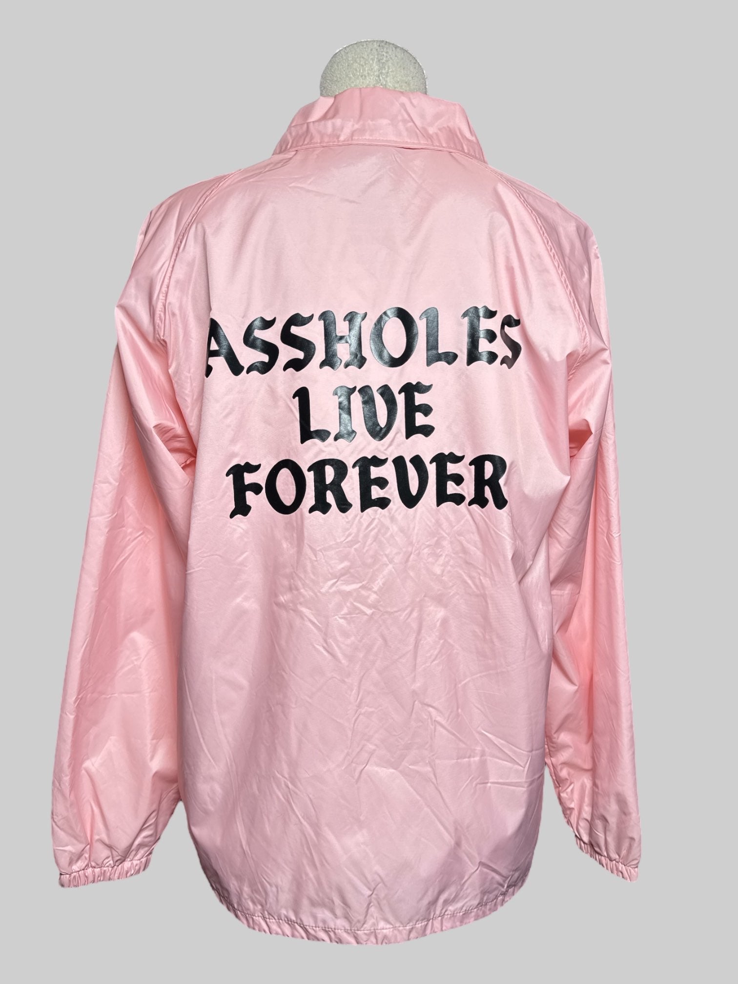 M Assholes Live Forever pink jacket with snap buttons