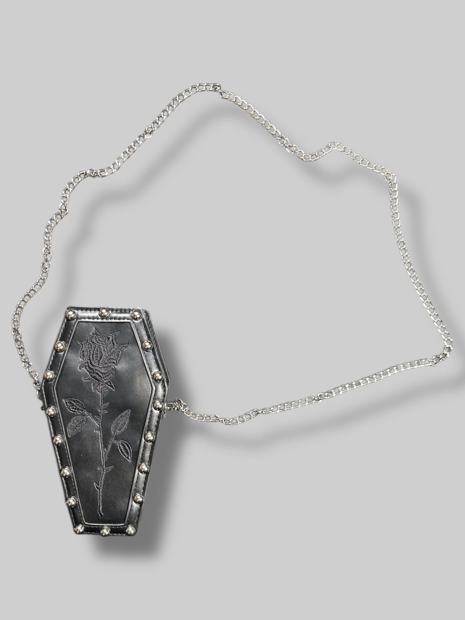 9’ by 5.5’ Small black coffin purse with studs, black embroidered rose, and removable strap