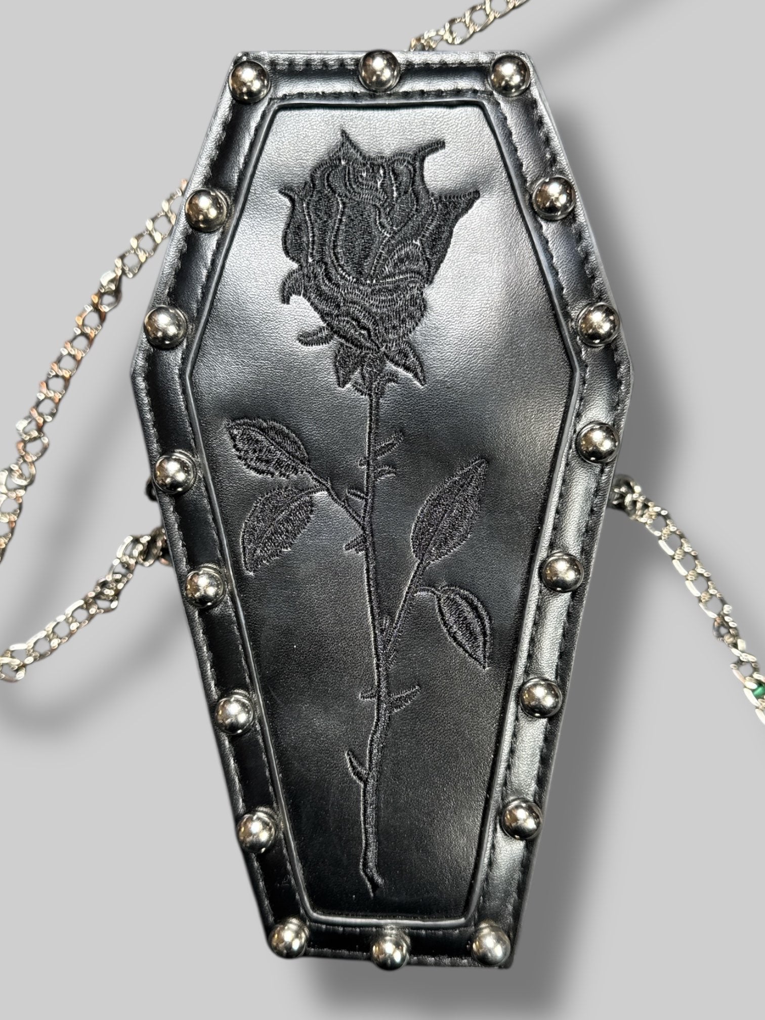 9’ by 5.5’ Small black coffin purse with studs, black embroidered rose, and removable strap