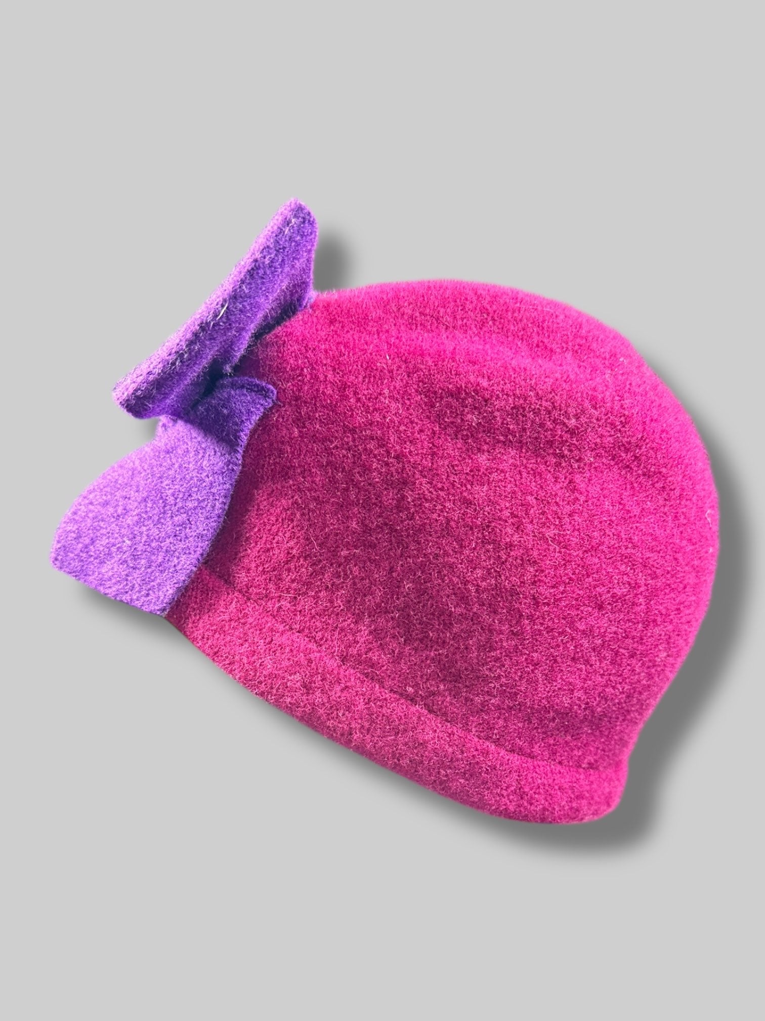 11’ by 8’ wool pink hat with purple bow