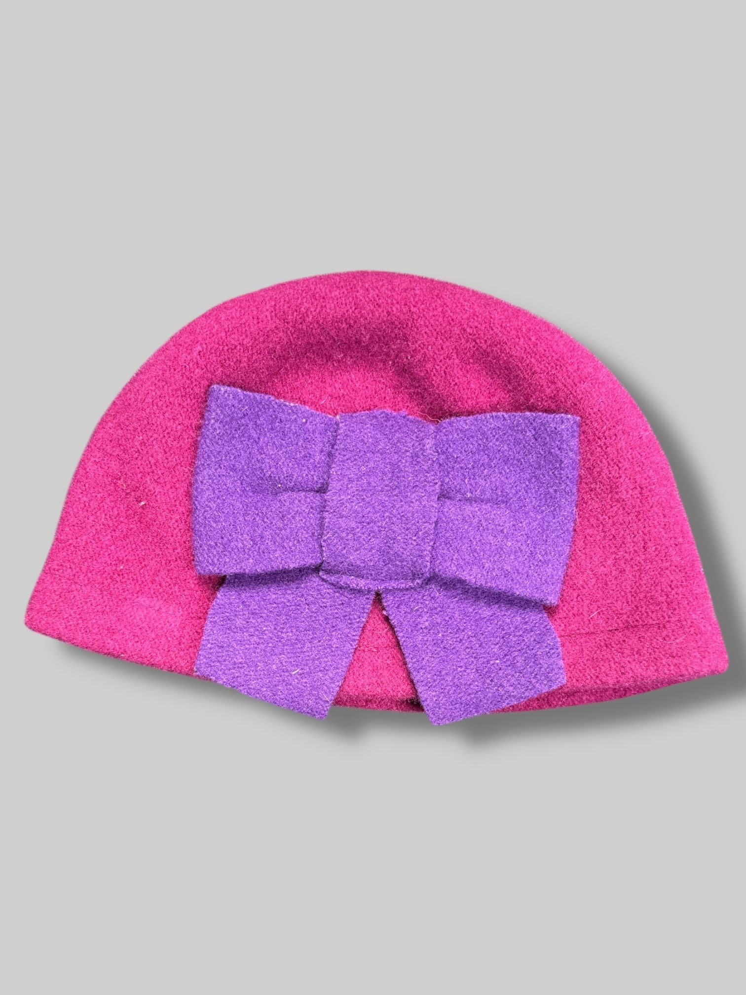 11’ by 8’ wool pink hat with purple bow