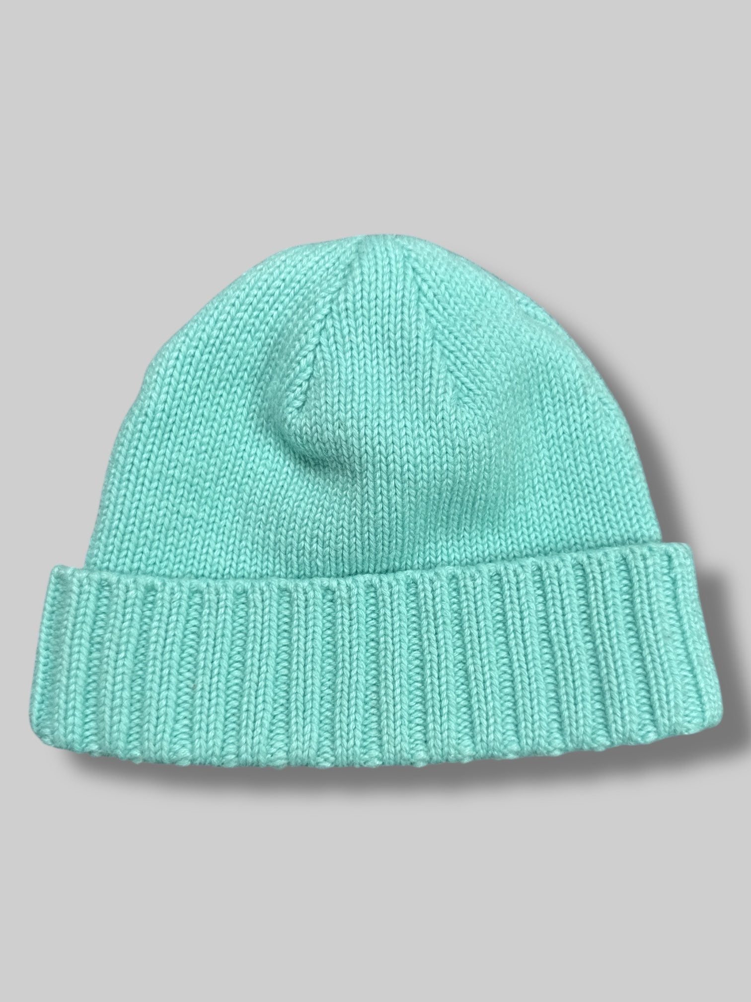 9’ by 7.5’ Diamond Supply Co bright blue knit beanie