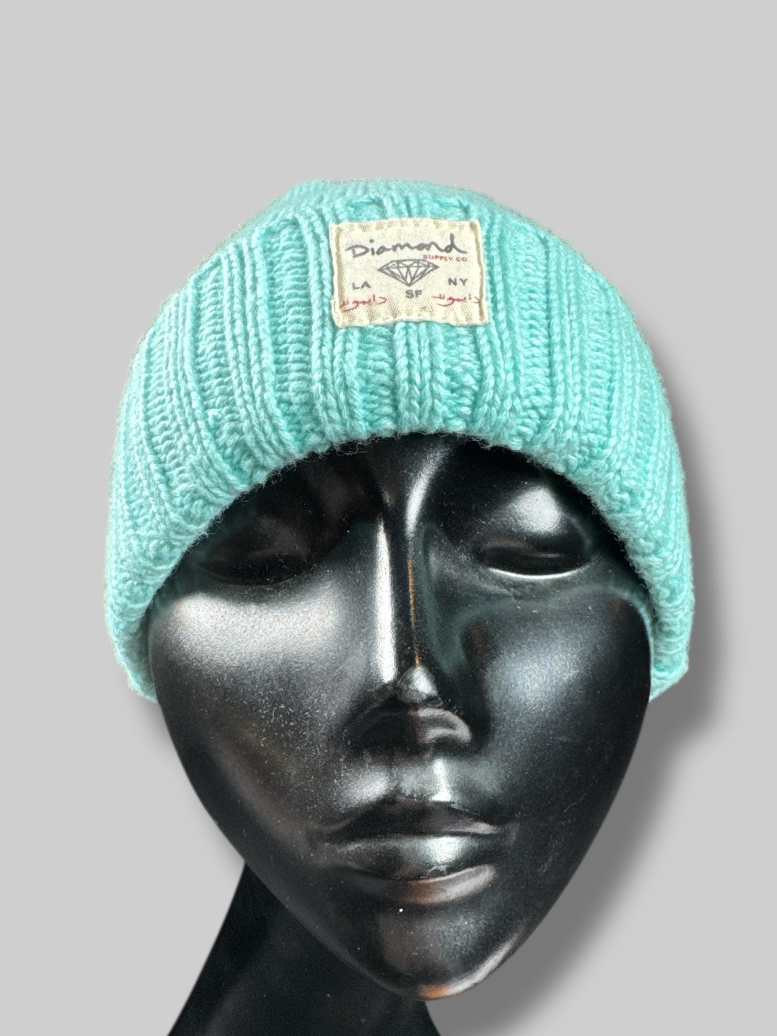 9’ by 7.5’ Diamond Supply Co bright blue knit beanie