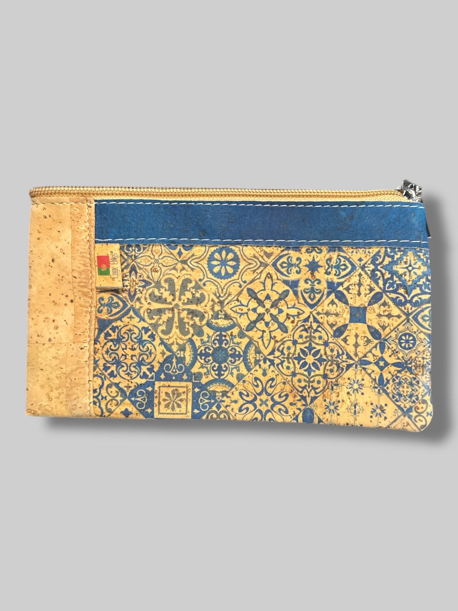 7’ by 4’ pouch made of cork with blue tiled mosaic pattern