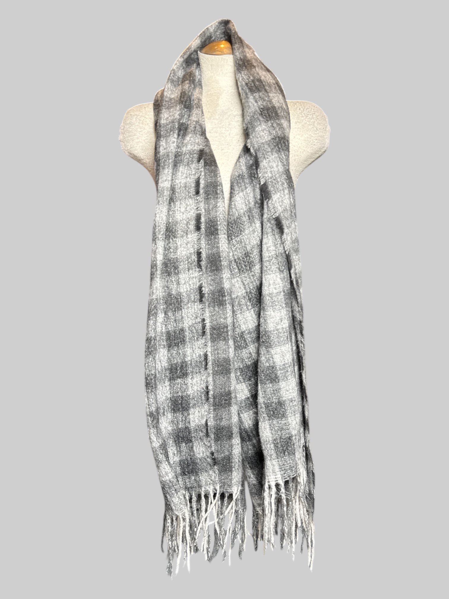 Gray, white, and black checkered flannel scarf with fringe, about 90"