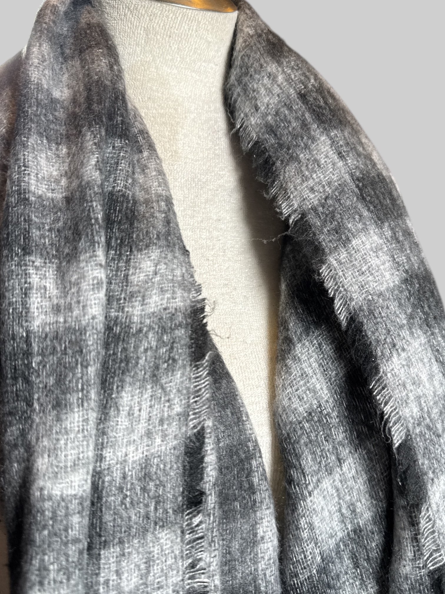 Gray, white, and black checkered flannel scarf with fringe, about 90"