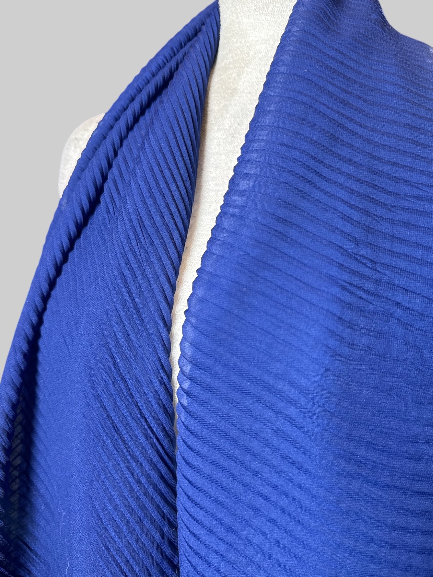 Blue ribbed scarf with gold color hem, about 100" long