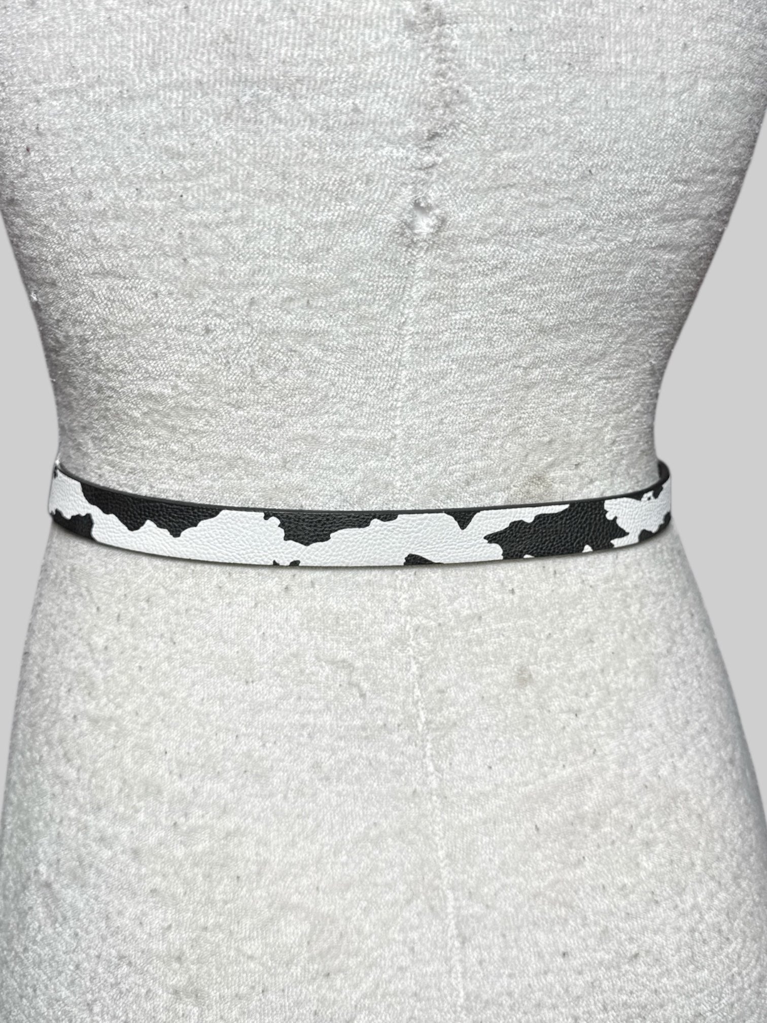 L-XL cow print belt