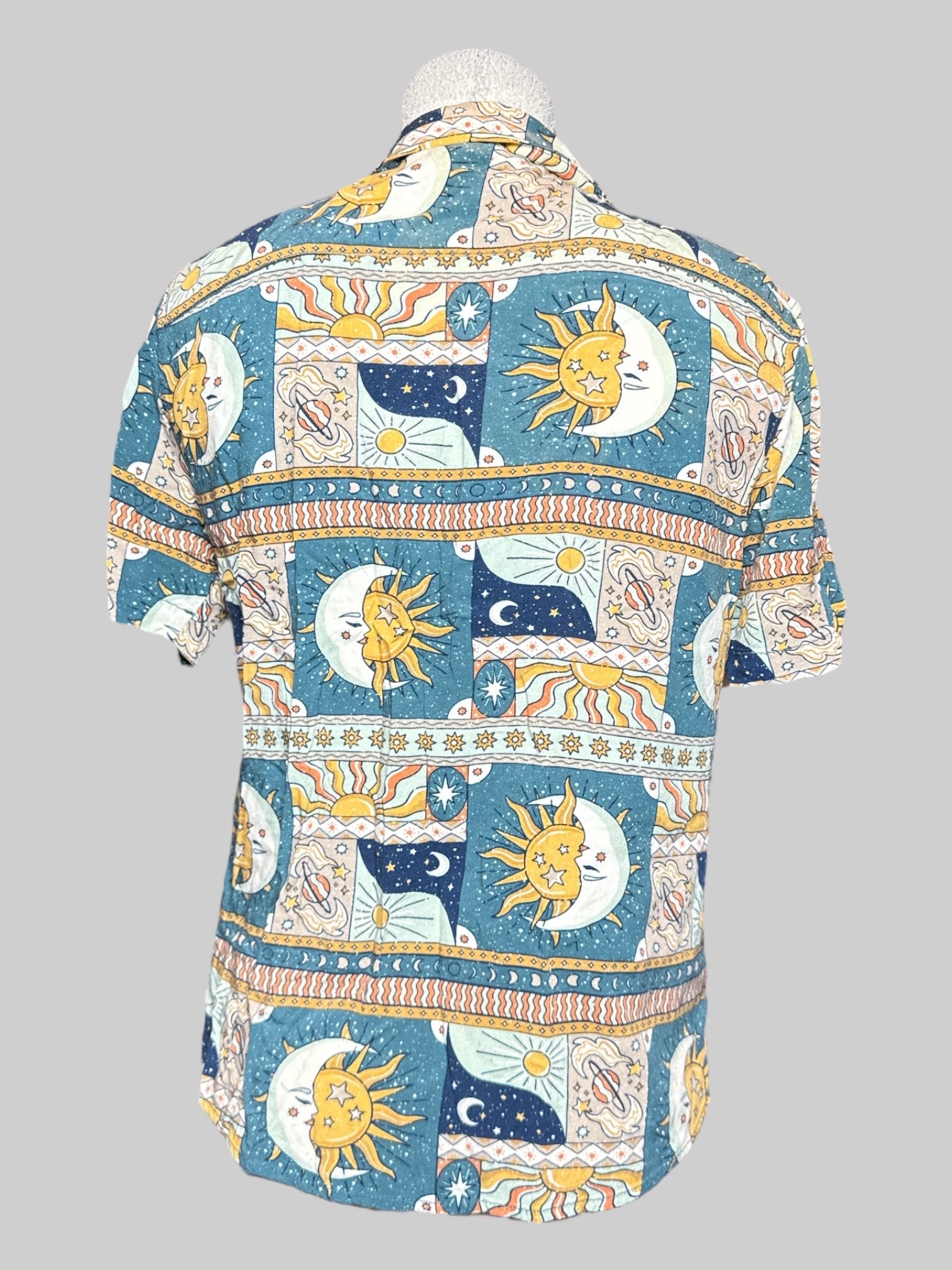 M Earthbound Trading Co teal short sleeve button down with celestial sun moon and planets design
