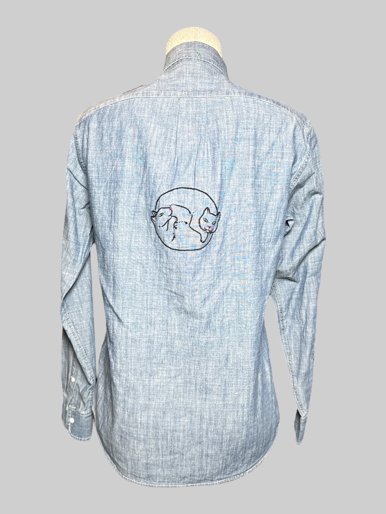 M J Crew Jeans blue denim button down top with front chest pocket, and hand embroidered design on back