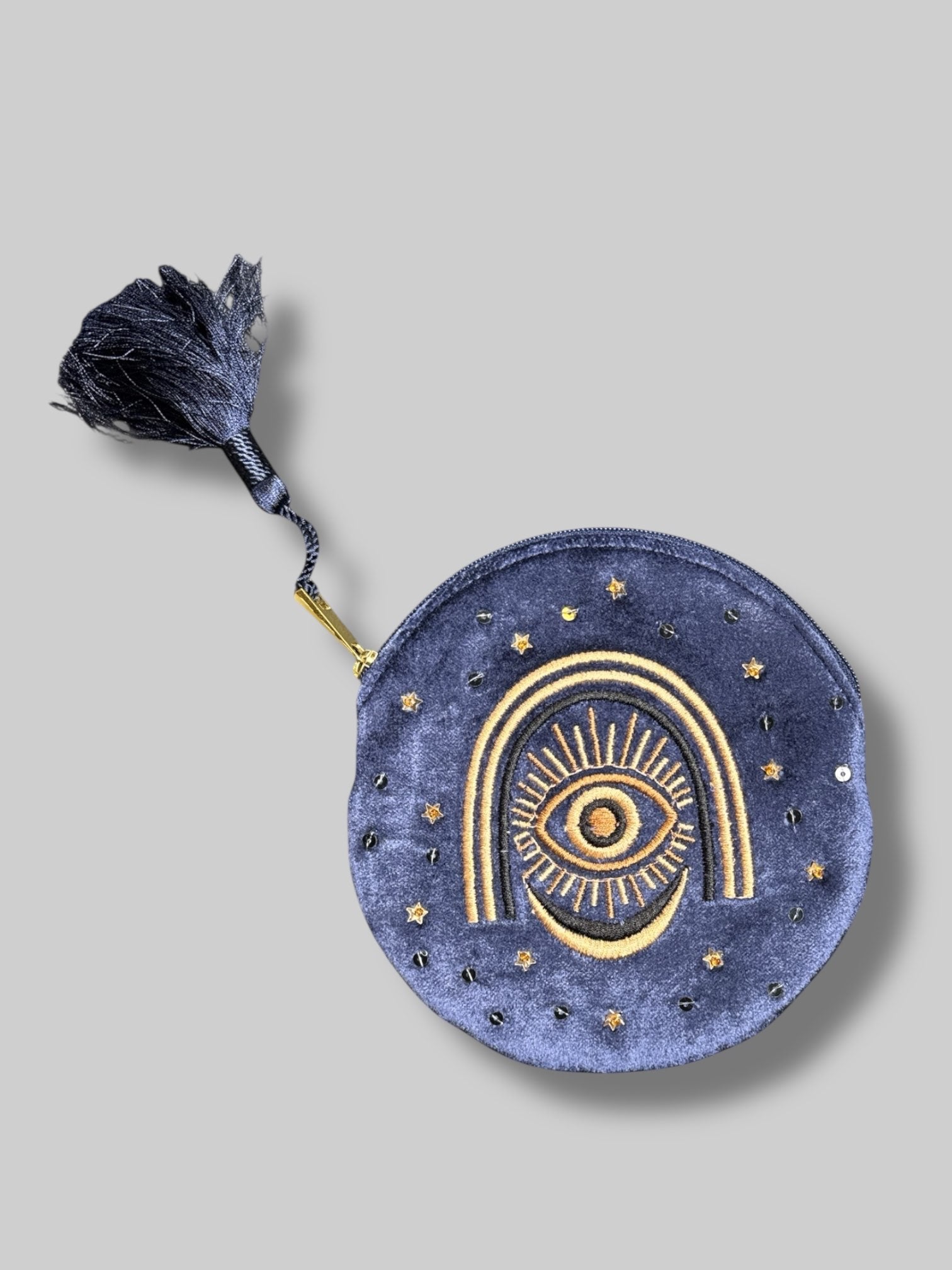 6’ velvet blue pouch with evil eye embroidery and fringe tassel on zipper