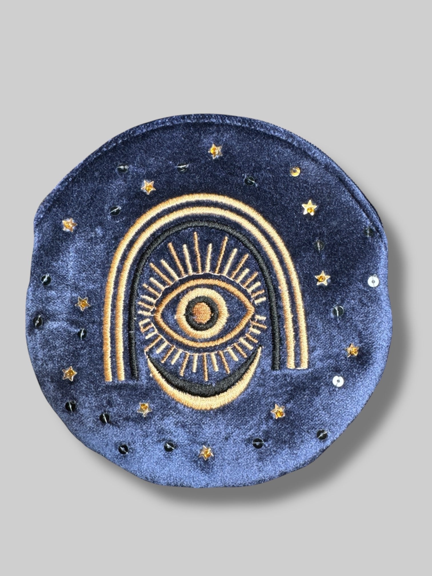 6’ velvet blue pouch with evil eye embroidery and fringe tassel on zipper