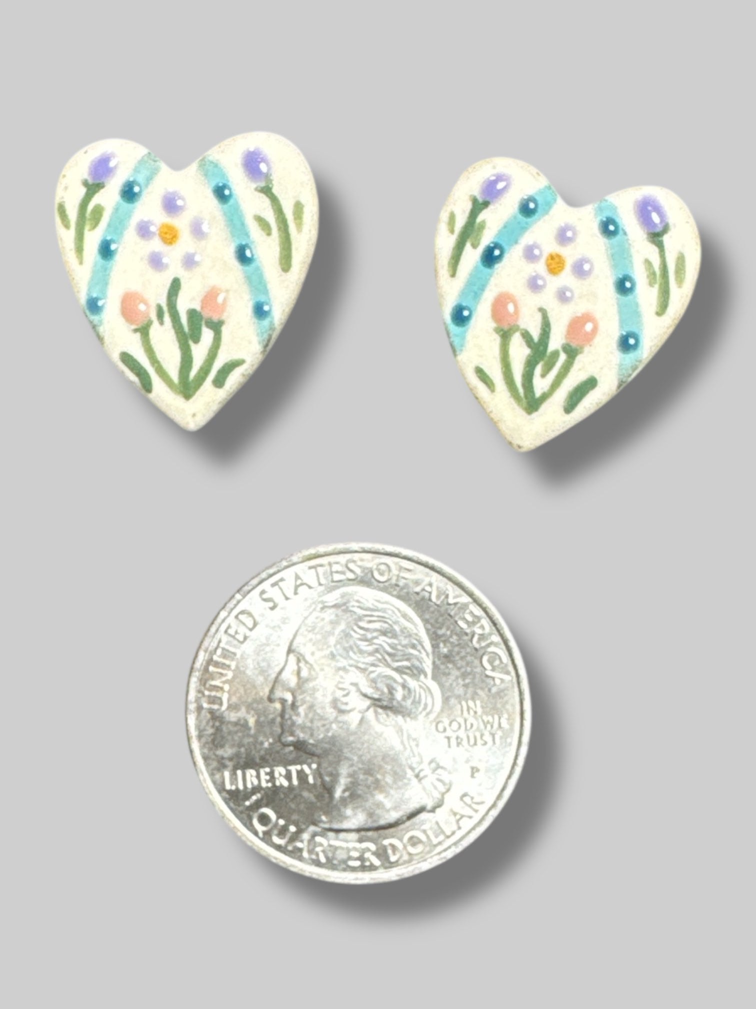 Handmade heart shaped earrings with florals