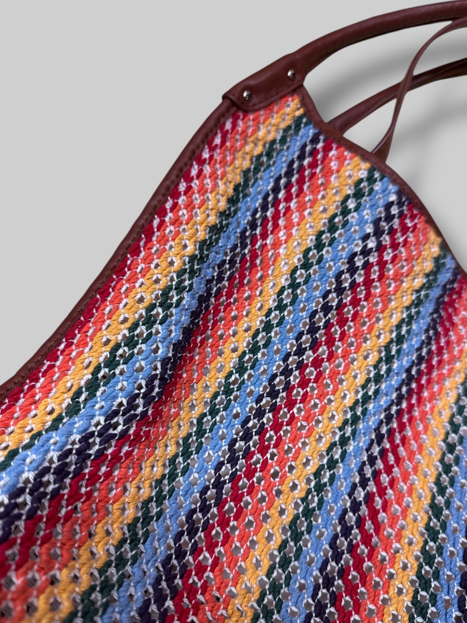 Rag & Bone Summer Passenger Tote made of multicolored crochet-knit recycled cotton with brown leather trim