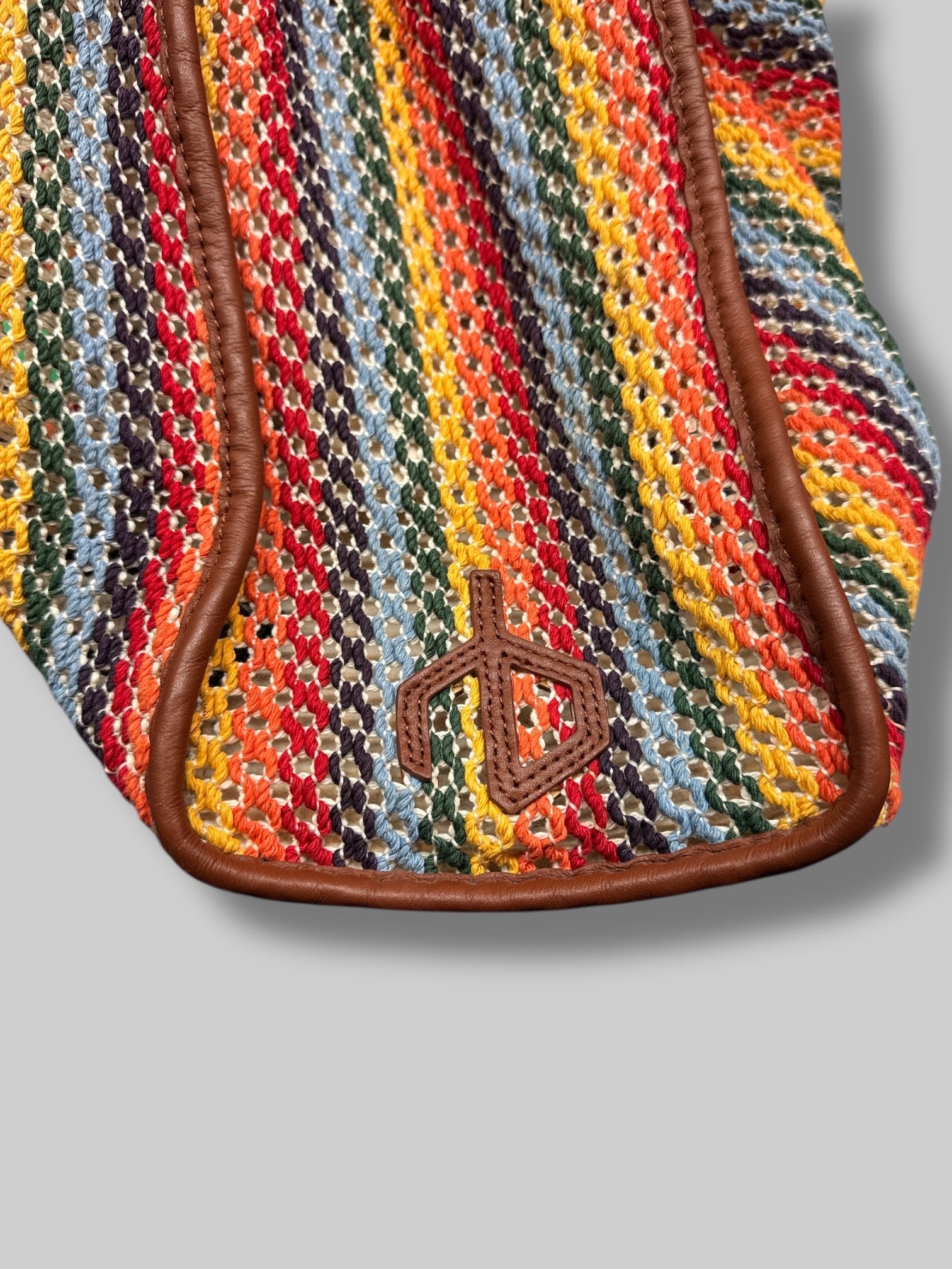 Rag & Bone Summer Passenger Tote made of multicolored crochet-knit recycled cotton with brown leather trim