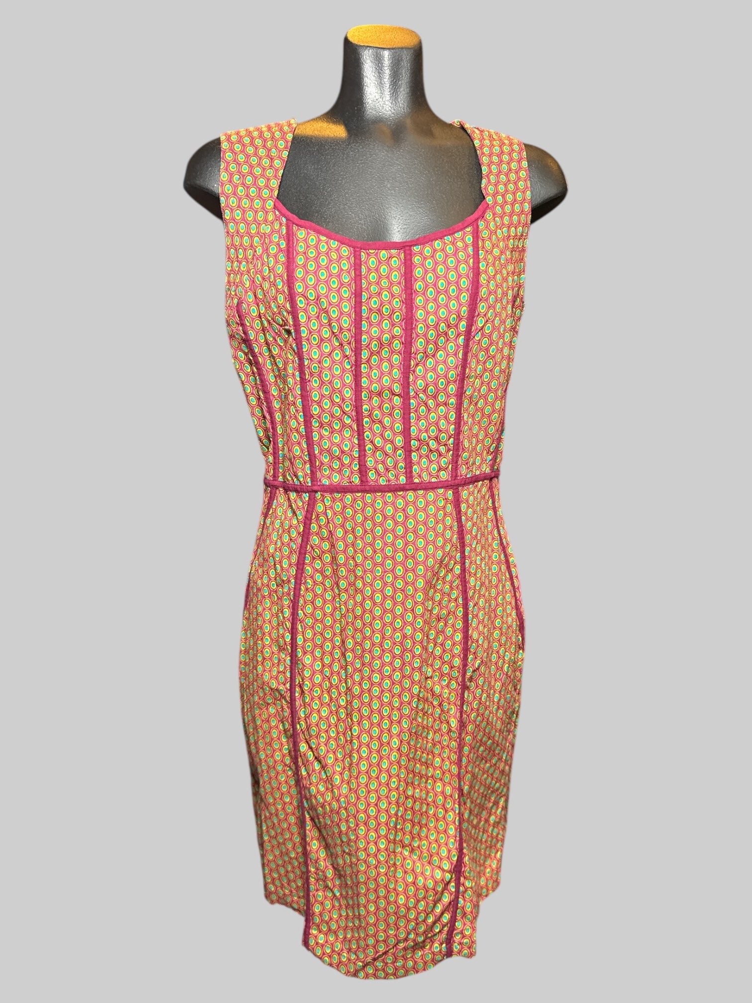 M Aleeza purplish sleeveless dress with orange, green, and blue geometric pattern, and zipper