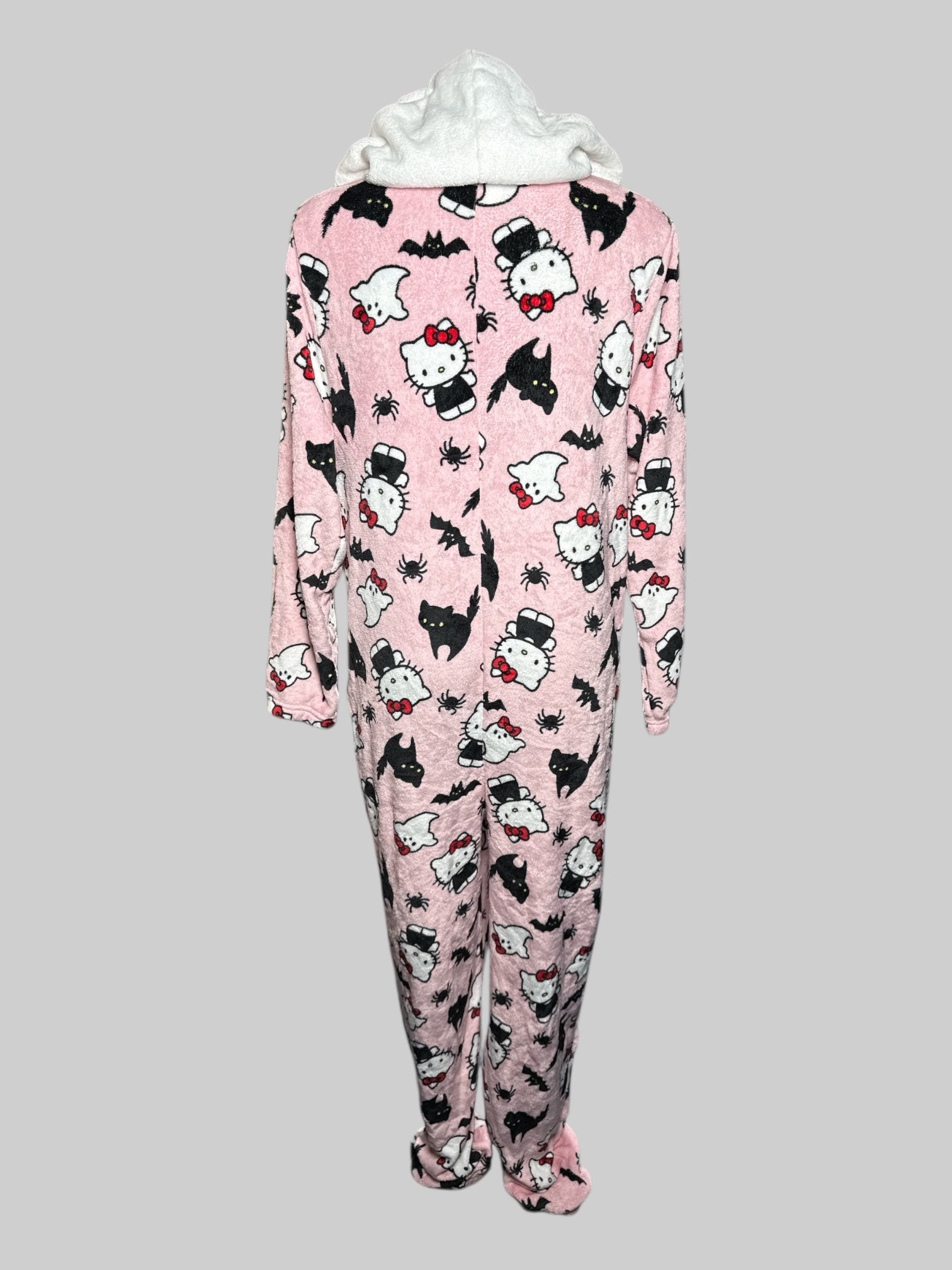 L Hello Kitty pink fluffy onesie with elastic foot cuffs, Hello Kitty hood, and spooky graphics