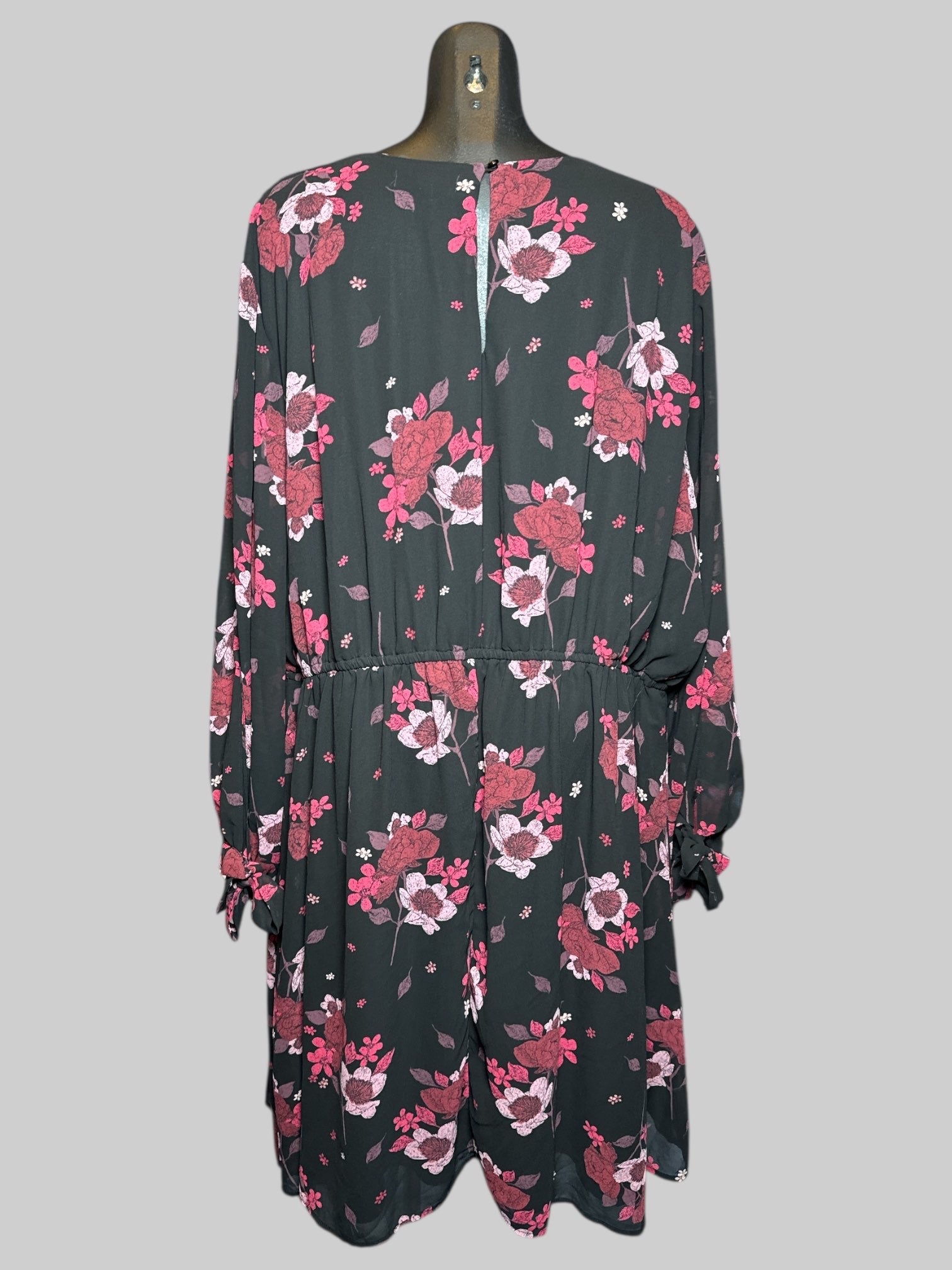 5X East Adeline black long sleeve dress with black embroidered neckline, pink florals, and ties on sleeves