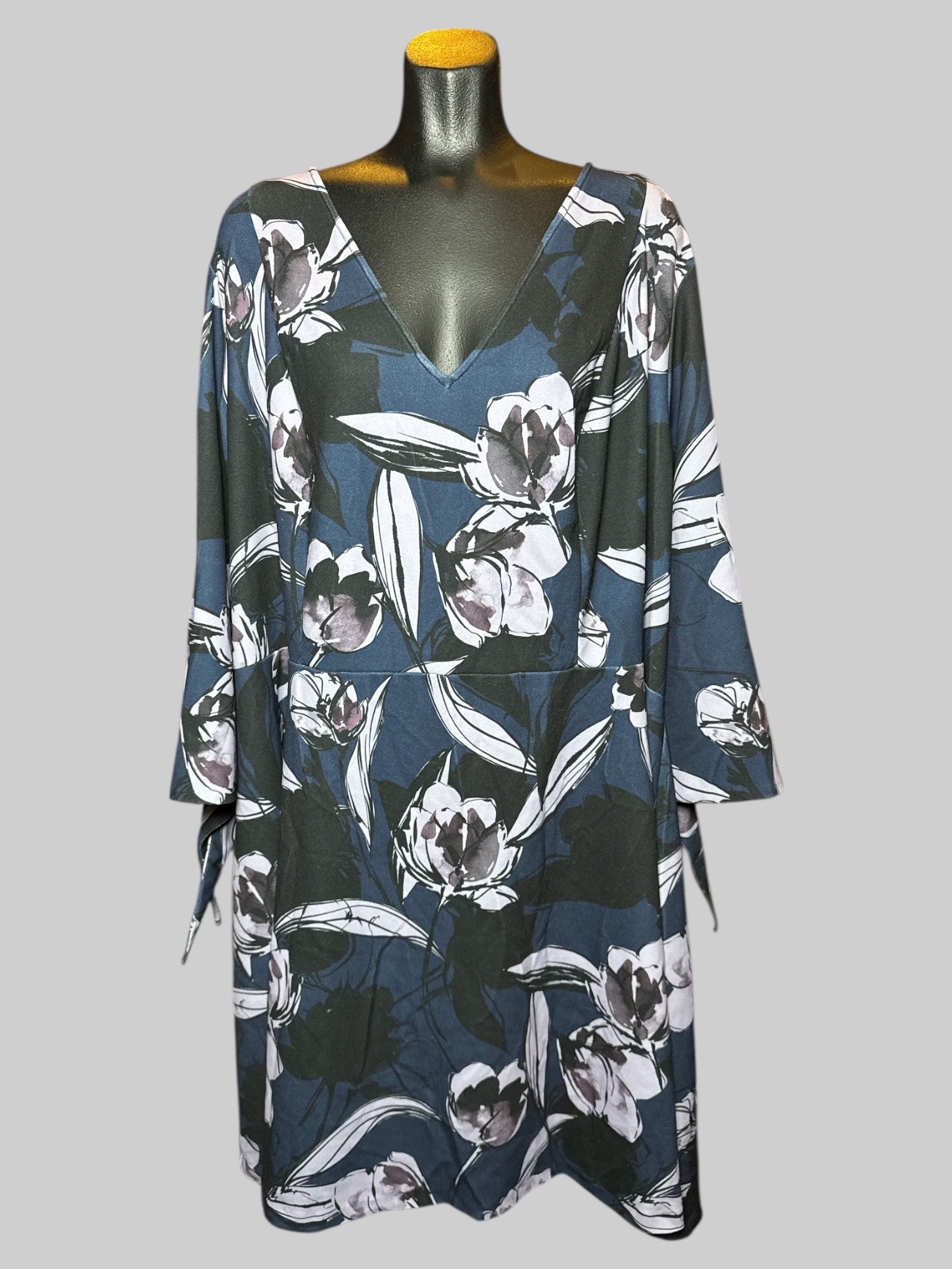 6X Alexis Admor navy blue, black, and purple florals design dress with half sleeves with ties on cuffs, and zipper on back
