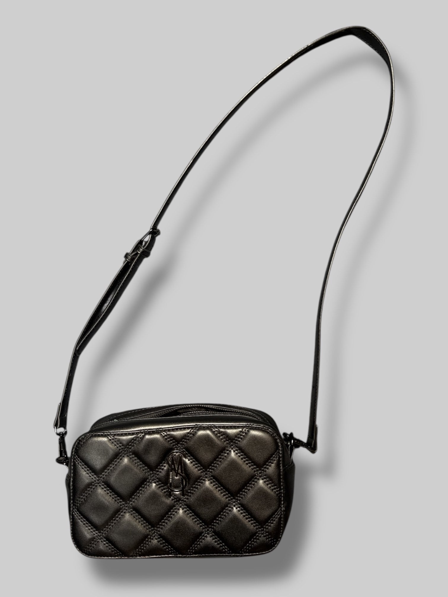 Steve Madden 10” by 5” black quilted bag with black removable strap and black removable fanny pack strap