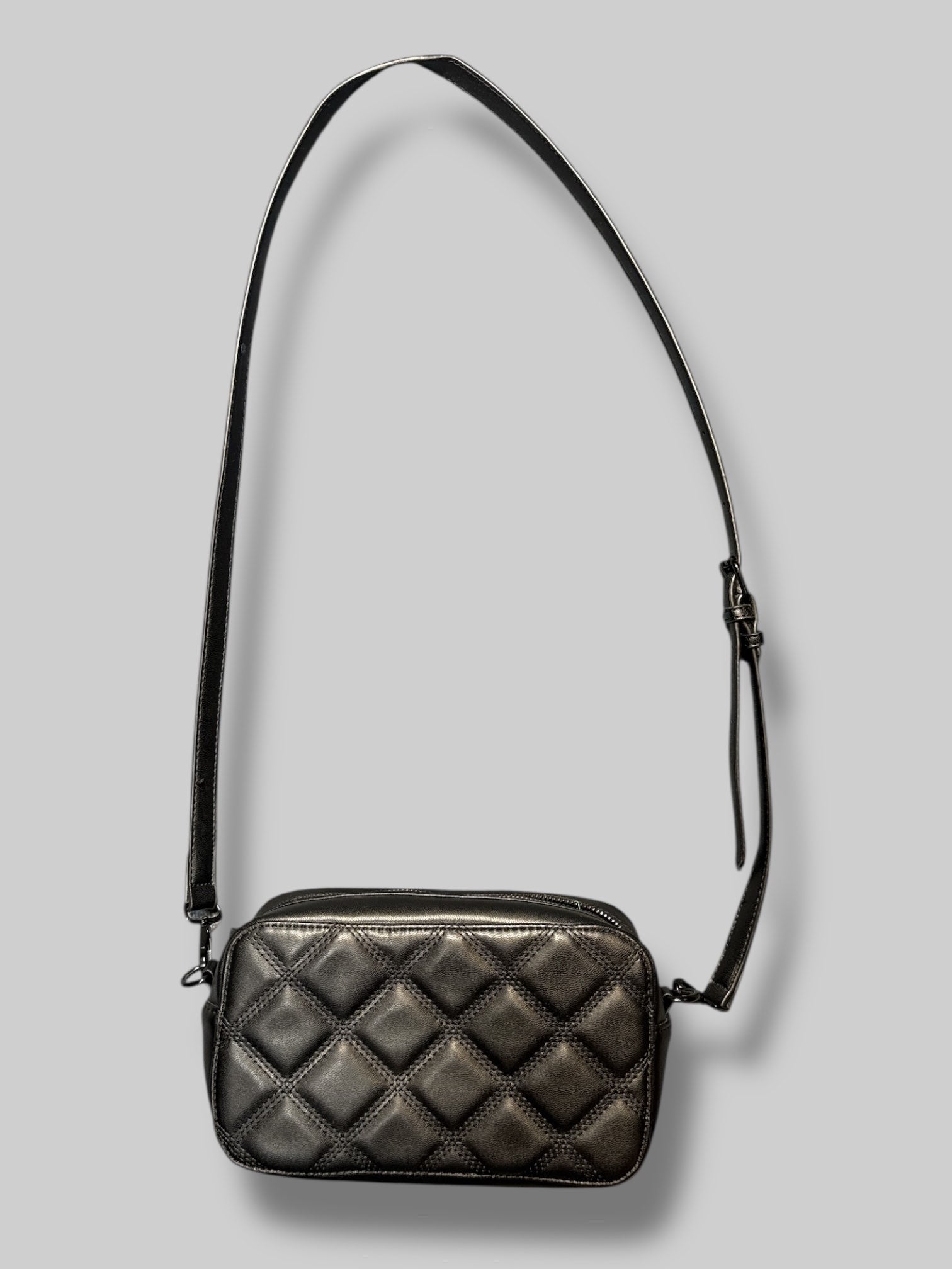 Steve Madden 10” by 5” black quilted bag with black removable strap and black removable fanny pack strap