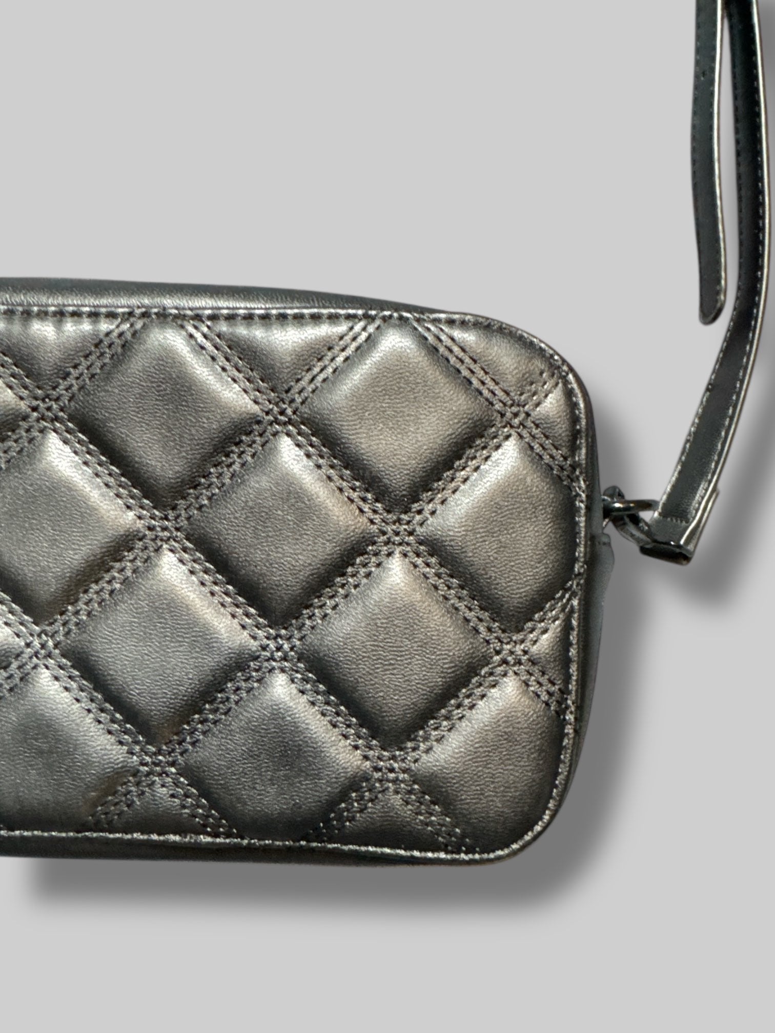 Steve Madden 10” by 5” black quilted bag with black removable strap and black removable fanny pack strap