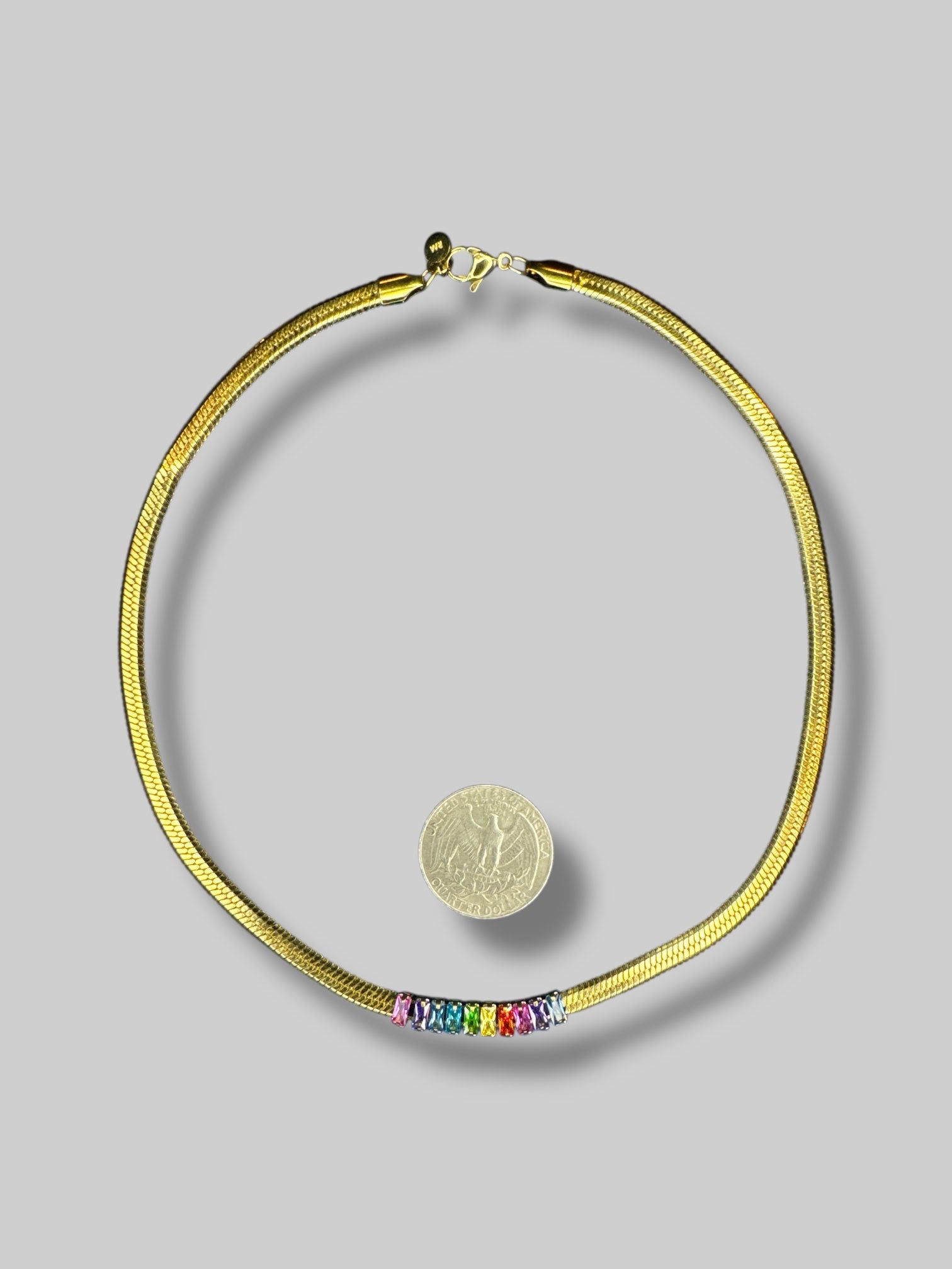 Gold chain necklace with rainbow stones