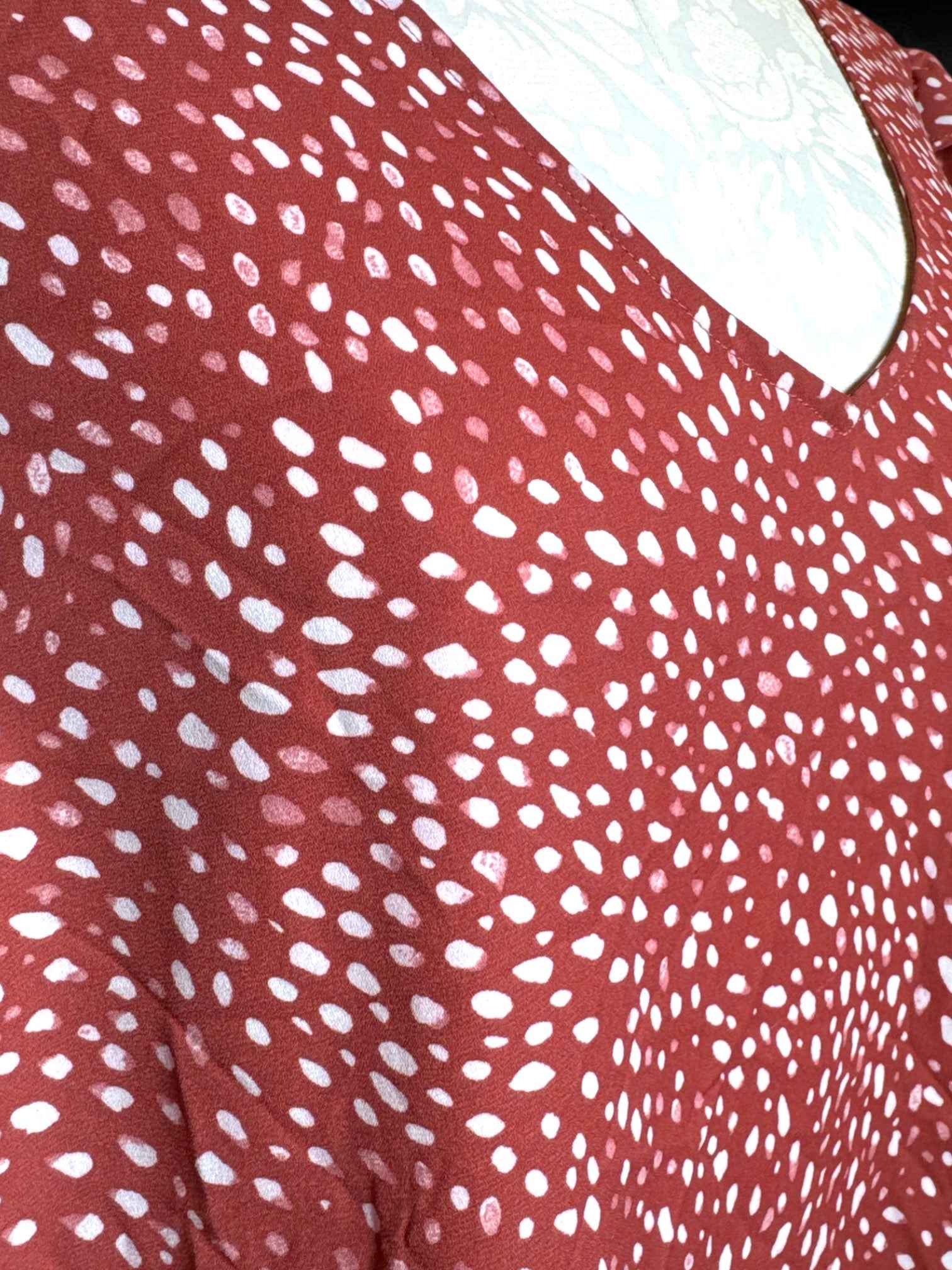 3X Torrid pinkish flowy top with white and pink spots
