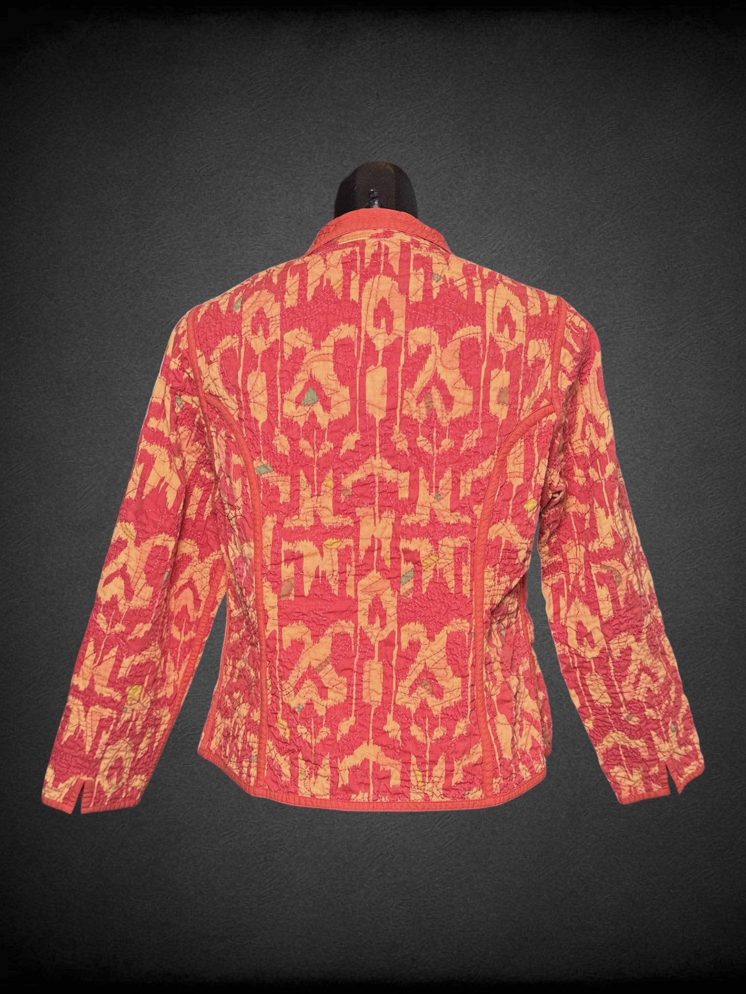 M Red-orange reversible quilted jacket with yellow and green accents