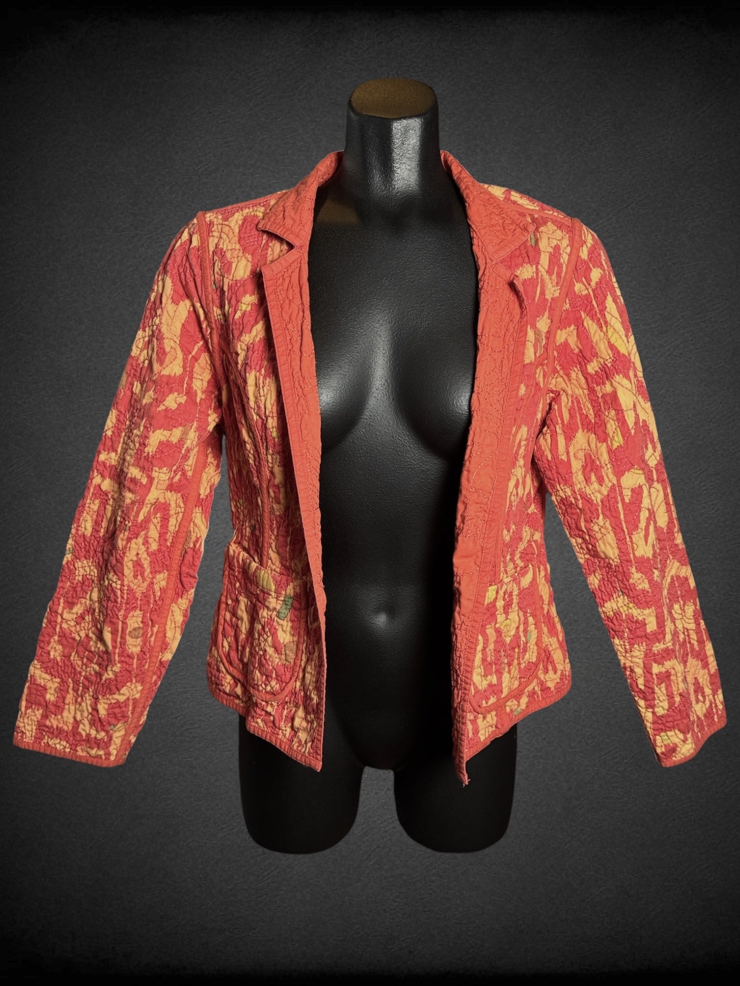 M Red-orange reversible quilted jacket with yellow and green accents