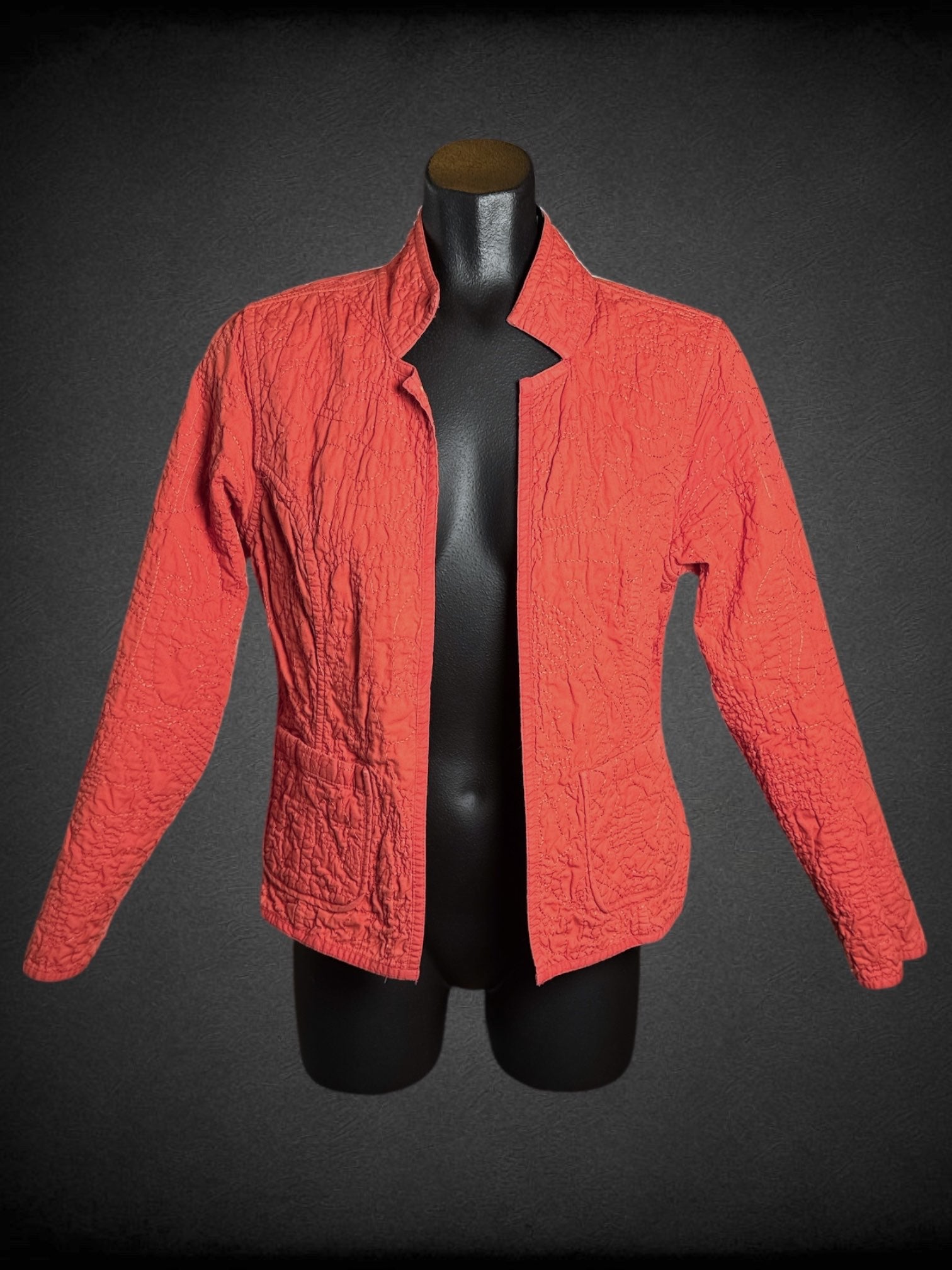 M Red-orange reversible quilted jacket with yellow and green accents