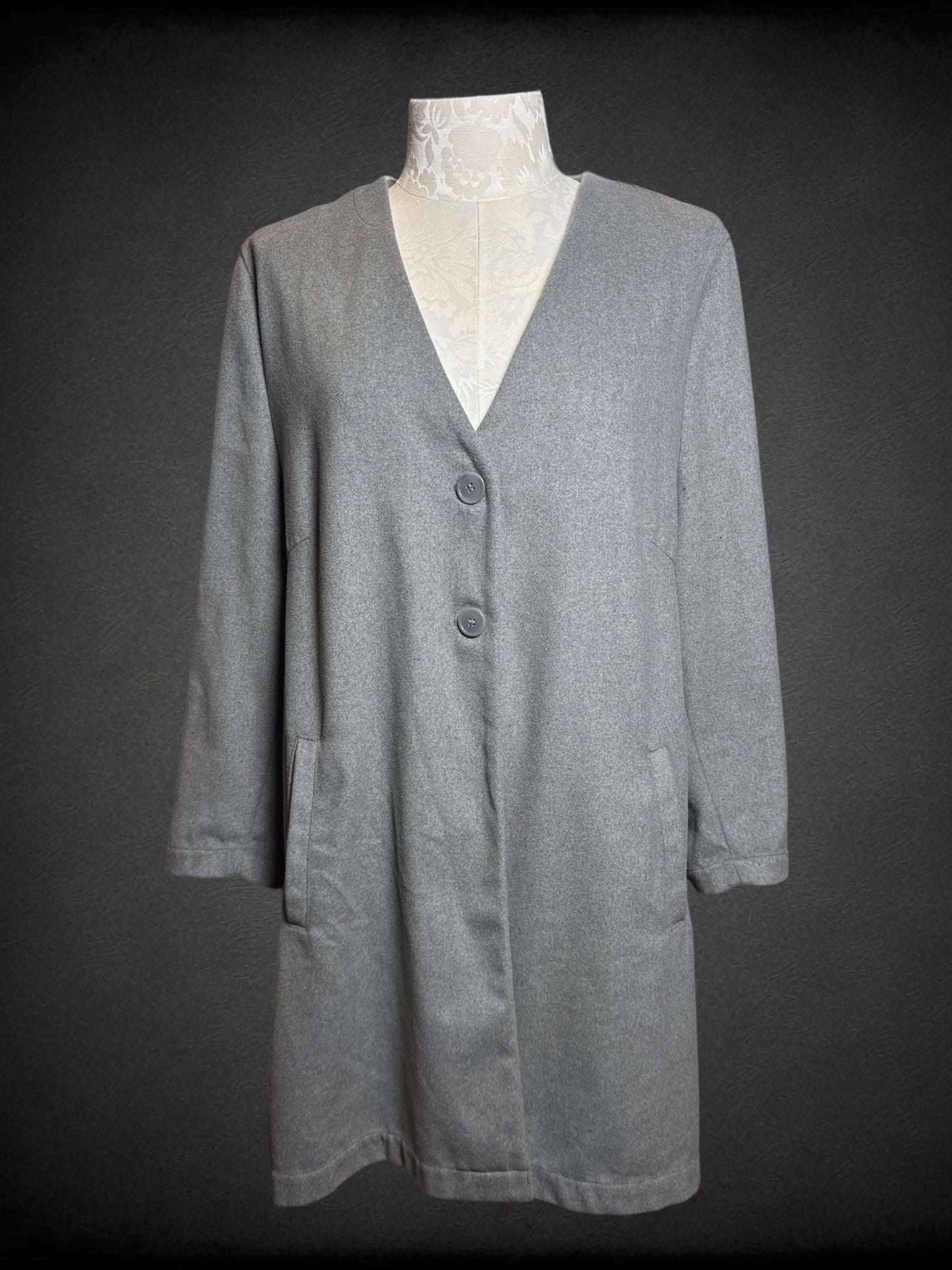5X CAPSULE light grey v-neck jacket with button closure and pockets. Small stain near bottom front hem photographed